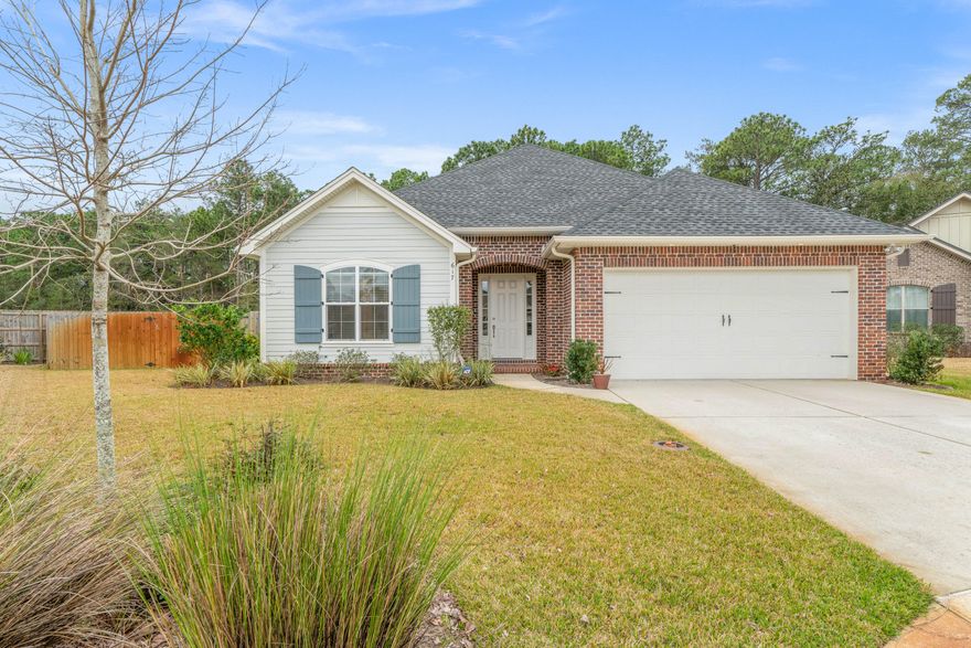 LOCATION, LOCATION, LOCATION! This beautiful 4 bedroom 3 full bath home is only 2 yrs old and located on a quiet cut de sac in sought after Magnolia Woods! Situated on one of the largest lots, there is ROOM FOR A POOL! Features 8 ft tall doors throughout, hardwood flooring, crown molding, beautiful white shaker cabinetry, screened back porch, Tankless gas water heater, and a fantastic floor plan! The Kitchen features a timeless design with white cabinetry and subway tile, stainless appliances, quartz countertops, Island with stool seating, and a built in matching server/coffee bar that provides tons of extra storage and functionality in the dining area. The master bedroom features a stunning master bath, in fact, all 3 bathrooms are amazing.This one is priced to sell so you better act NOW!