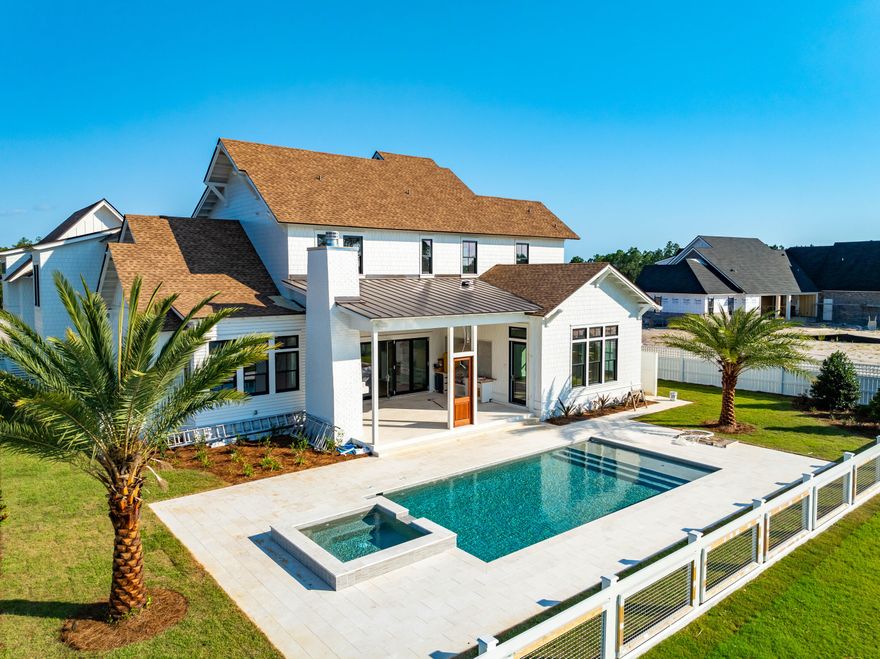 JUST COMPLETED! Located in the prestigious Watersound Camp Creek neighborhood, 65 Morning Light Way is a magnificent estate home that seamlessly blends contemporary elegance with classic design. This exquisite residence spans an impressive 4,460 square feet with a four bedroom primary home, a one bedroom carriage home above the two-car and golf cart garage, and a private heated pool and spa. A welcoming entryway ushers you into bright and airy spaces defined by natural light and fine finishes incorporated into every detail of the home. Arched hallways, transom windows, coffered ceilings, shiplap ceilings, board and batten accents, and intricate tile work are just highlights of the unique character evident throughout. On the first level, the expansive living and dining area opens to an equally spacious outdoor living area through bifold doors seamlessly integrating inside and out. The gourmet kitchen is expertly appointed with custom cabinetry, a stunning backsplash over the range, Wolf and Sub-Zero appliances, and designer lighting. The primary suite is a true owner's retreat on the first level, while three spacious guest suites are located on the second, and the final guest suite in the carriage home. This impeccable property presents a special opportunity for discerning homeowners seeking a luxurious lifestyle mere moments from the shimmering gulf waters of the 30A coast.
 
Owners in Watersound Camp Creek have the opportunity for direct access to the St. Joe Club amenities at Camp Creek including resort pools, an 11,000 square foot fitness center, racket courts, multiple private dining venues, and Tom Fazio designed golf course. Other member benefits include the Watersound Beach Club amenity center with complimentary gulf-front chair and umbrella service. Members may also enjoy golf at the private Shark's Tooth course at Wild Heron and The Third, the club's newest course currently under construction.
 
