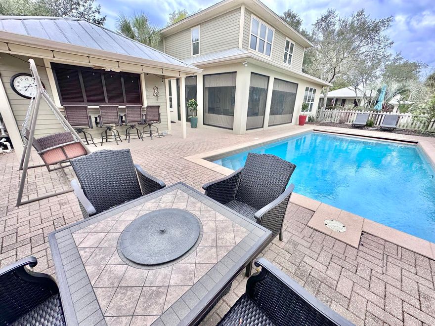 Located in the heart of Sandestin Golf and Beach Resort, Crystal Lake is a charming lakefront community, with short term rentals restricted. Crystal Lake homes are sought after. This 4 BR, 3 full and 2 half baths is beautifully landscaped, sits on a large corner lot. It comes Professionally furnished and offers upgrades throughout including: Travertine, wood, granite, crown molding, recessed lighting, raised ceilings, just to name a few. The sellers just installed new  LVP flooring on the second floor. It offers a 14 x 30 heated pool, brick paver decking and pool house. This is unique in Crystal Lake. The pool house has its own bath, Changing area, extra storage room, refrigerator, outside shower and a private poolside bar. Perfect for a family getaway or primary residency.