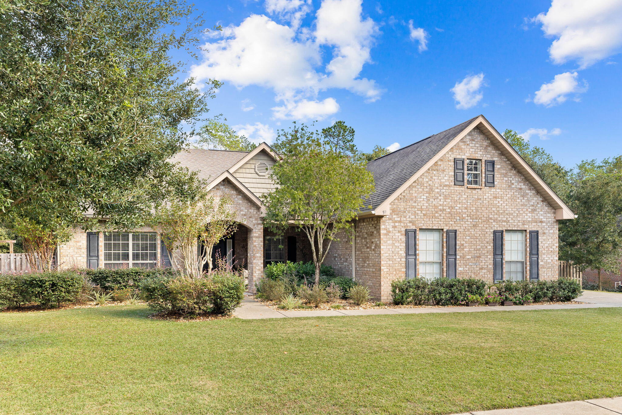 Motivated Sellers! - Nestled in the sought-after community of Hammock Bay, this lovely all-brick home offers the perfect blend of space, comfort, and style. Situated on a large, private lot and bordering a nature preserve, this 5-bedroom home provides plenty of room to grow and thrive. As you enter, you're greeted by a spacious foyer that leads to an oversized family room--ideal for both entertaining and relaxing. The wood-burning stove adds a cozy touch, perfect for chilly evenings. The heart of the home is the large, well-appointed kitchen, which features an abundance of cabinetry and counter space, making meal prep a breeze.The impressive primary suite is a true retreat, featuring a generous walk-in closet and an en-suite bath with dual vanities. Four additional bedrooms provide ample space for privacy and guests, or a home office. 
The flexible floor plan also includes a formal dining room or den perfect for your needs.
You'll enjoy extra convenience with climate-controlled storage, ideal for keeping your belongings safe and organized year-round.
Step outside to your own personal paradise! The expansive backyard provides an ideal space for play, relaxation around the firepit, and gardening.
Hammock Bay boasts several world-class amenities including two zero-entry pools as well as a lap/play pool, perfect for both fitness and fun. Outdoor enthusiasts will love the tennis, pickleball, and basketball courts, as well as miles of hiking, biking, and walking trails for recreation and exercise. The community's dog park and general store add to the convenience and enjoyment of this incredible community. 
Situated just minutes from schools and the Freeport Sports Complex, this home offers an unparalleled lifestyle.