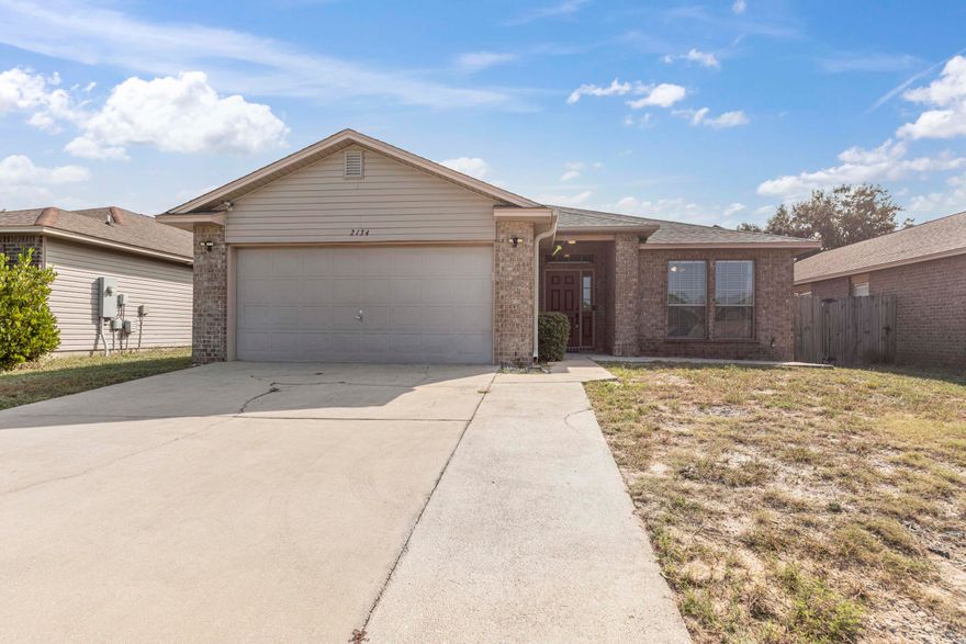 Welcome to your dream home, just 10 minutes from the stunning Navarre beaches! This single-family residence features 3 bedrooms and 2 bathrooms, with a brand new roof (2024) and water heater (2024). Step inside to discover the modern charm of updated indoor plumbing (2023), a beautifully renovated master bathroom (2023), a freshly painted living area (2023), and the home is equipped with solar panels to help reduce energy costs.Enjoy the freedom of an open concept layout, perfect for both relaxing and entertaining. This home is nestled in a cozy neighborhood with only one entrance and exit, offering peace and privacy without the constraints of an HOA.Outside, you'll find a welcoming back covered patio and a privacy fence, ideal for enjoying the Florida sunshine in seclusion.