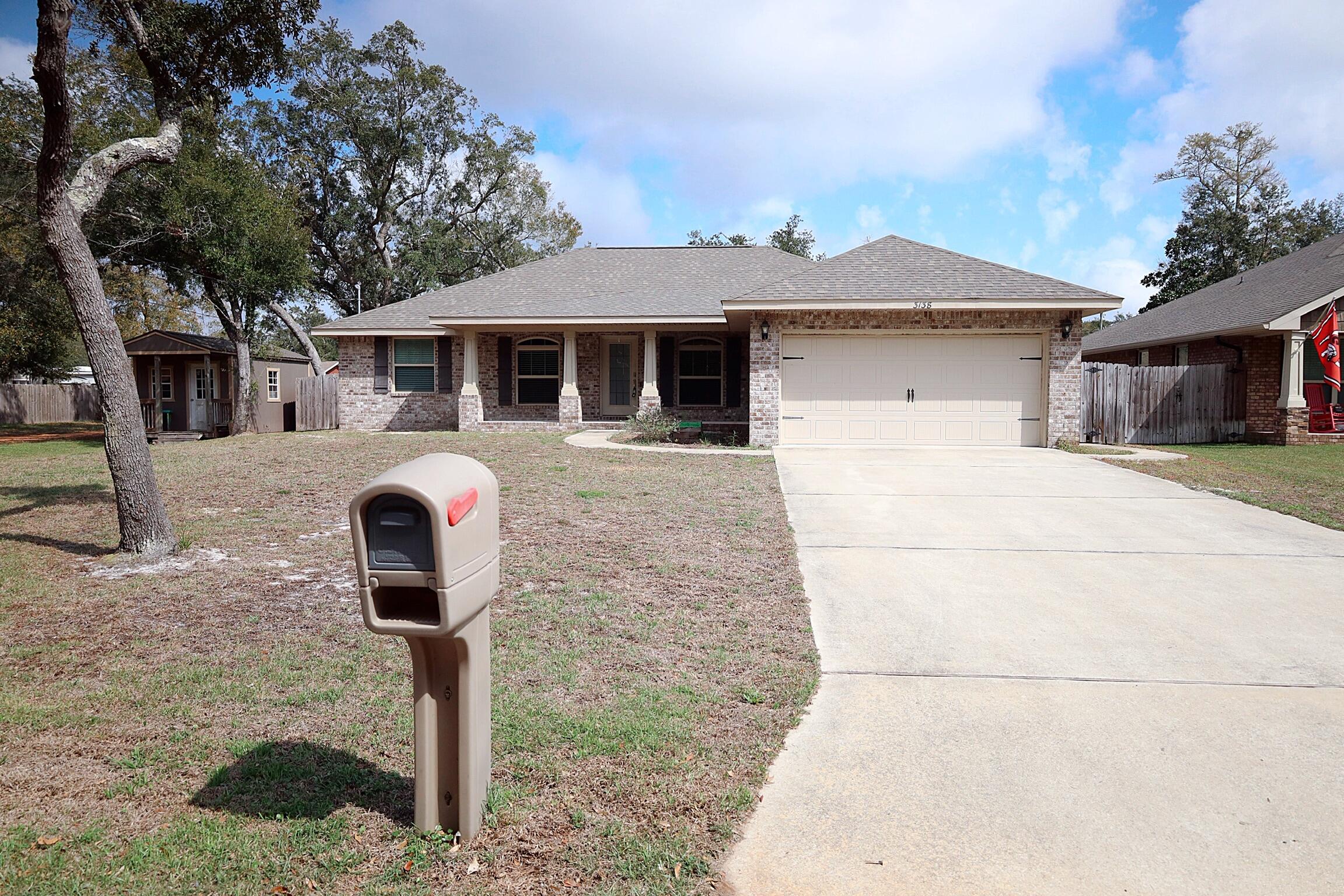 Buyers financing fell through, no fault to the seller!If a life near the water is what you seek, then your search ends here! This all brick 3 bed 2 bath home sits on a corner lot within steps of the Holley boat ramp! A beautiful day on the East Bay couldn't be easier with NO HOA & NO flood insurance req'd! This home is fitted with carpeted bedrooms, & LVP flooring throughout. Vaulted ceilings, breakfast bar, breakfast nook, & granite counter tops compliment the modern kitchen. Master bath is complete with His&Her separate granite vanities, separate closets, a garden tub, & separate shower! Theres Plenty of yard space, Automatic sprinklers, and shed staying with the home. Covered front porch & a 16'x14' covered back porch begs for outdoor relaxation. Schedule your showing today!