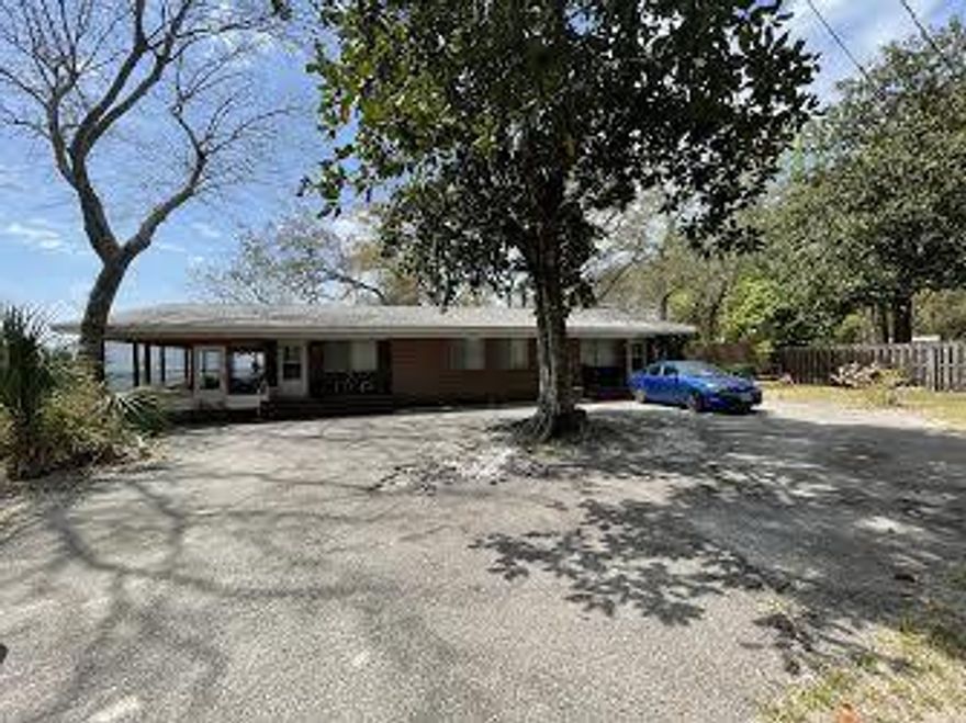 Do not disturb tenants! Duplex- 2 bedrooms/2 full baths units with views of Lake Vivian, Choctawhatchee Bay and Okaloosa Island on the horizon. New Roof completed in 2018. Unit A has a screened in large porch. This unit has been completely remodeled in 2018 from the studs. New flooring, New walls, New appliances, New fixtures, New HVAC in 2017, New Water Heater, and all bathrooms have been remodeled with an easy walk in shower. Unit B New Water Heater 2021, New Oven 2016, New paint in Kitchen and Family room, paneling in the bathrooms and bedrooms.  The County just finished a project that elevated Meigs drive in front of the property. Both units are occupied at this time on a month to month. All measurements must be verified by the buyer.