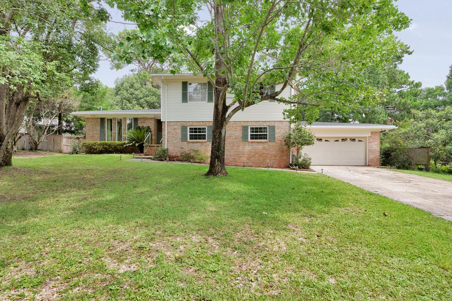 Welcome home to this split level home in Poquito Bayou! Brand NEW ROOF in January 2020.  Upon entering this home, you are in the bright living room, which flows into the the eat-in kitchen.  The kitchen has a gas stove, breakfast bar, and tons of storage for all your cooking gadgets.  The eat in area has a sliding glass door that gives you access to the screened in porch, perfect for relaxing with your favorite beverage. The fenced and shaded backyard is spacious with plenty of room for a POOL! The upstairs houses the master bedroom, 3 other bedrooms, and linen closest.  Downstairs there is an additional bedroom with TWO closets (one of which is a walk-in), en suite bathroom, AND private access to the backyard.  Downstairs also boasts a large den or family room complete with a brick