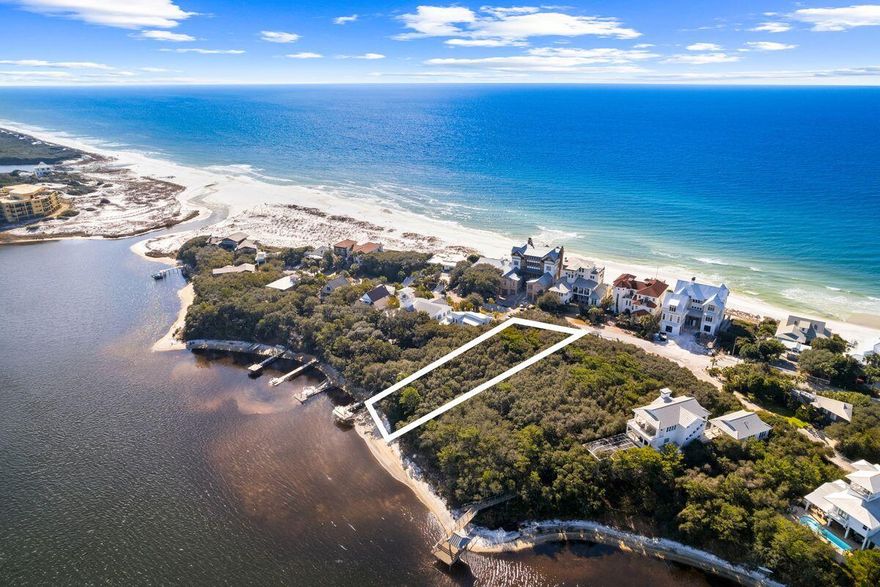 Discover a rare gem nestled on the serene shores of Red Fish Lake, a coastal dune marvel, located within the enchanting enclave of Blue Mountain Beach. This distinguished lakefront property beckons with the promise of an idyllic coastal lifestyle. A mere whisper away from a charming, low-density beach access, this .37-acre expanse welcomes you with depth and freedom. There are no HOA restrictions or demanding build-out timelines, granting you the liberty to shape your dream home without constraint. Envision crafting your private dock upon the tranquil waters, indulging in picturesque sunsets. Tucked discreetly behind the health food store, this oasis offers an oasis of tranquility, a hidden treasure moments from the acclaimed Redfish Village, Blue Mountain Creamery and Cowgirl Kitchen. Immerse yourself in the potential for gulf vistas, as Walton County permits residences reaching heights of up to 50 feet. Whether envisioning a primary residence or a coastal retreat, this sublime property presents an unparalleled opportunity to savor the best of Blue Mountain Beach's coveted lifestyle, with the pristine lakefront mirroring the allure of the nearby beach, a symphony of nature's finest melodies.