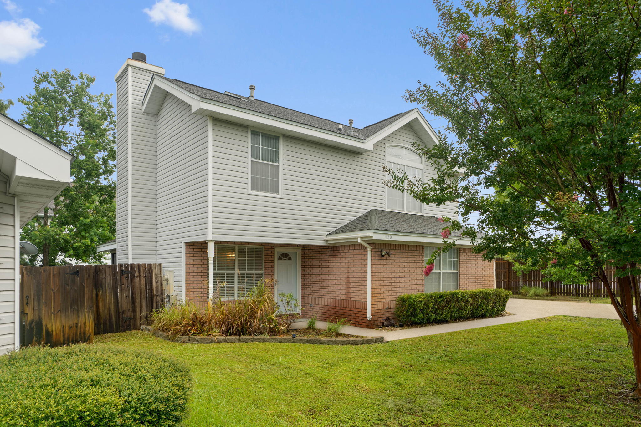 Welcome to this perfect Mary Esther starter home just minutes from Hurlburt Field! This house has been fully repainted and ready for its new owner. The property features a massive driveway and side yard to park a boat or any other toys! Step inside the front door and find yourself in the cozy Livingroom with a wood burning fireplace. The kitchen features stainless steel appliances to include a gas stove. Connected to the kitchen is the laundry room (washer & dryer included) and a half bath before leading out to the garage. Upstairs hosts all 3 bedrooms to include the master with a huge vaulted ceiling. The big 3 are fairly new in age! Roof 2018, HVAC 2018, WH 2017. The property resides in Flood zone X and has no HOA!