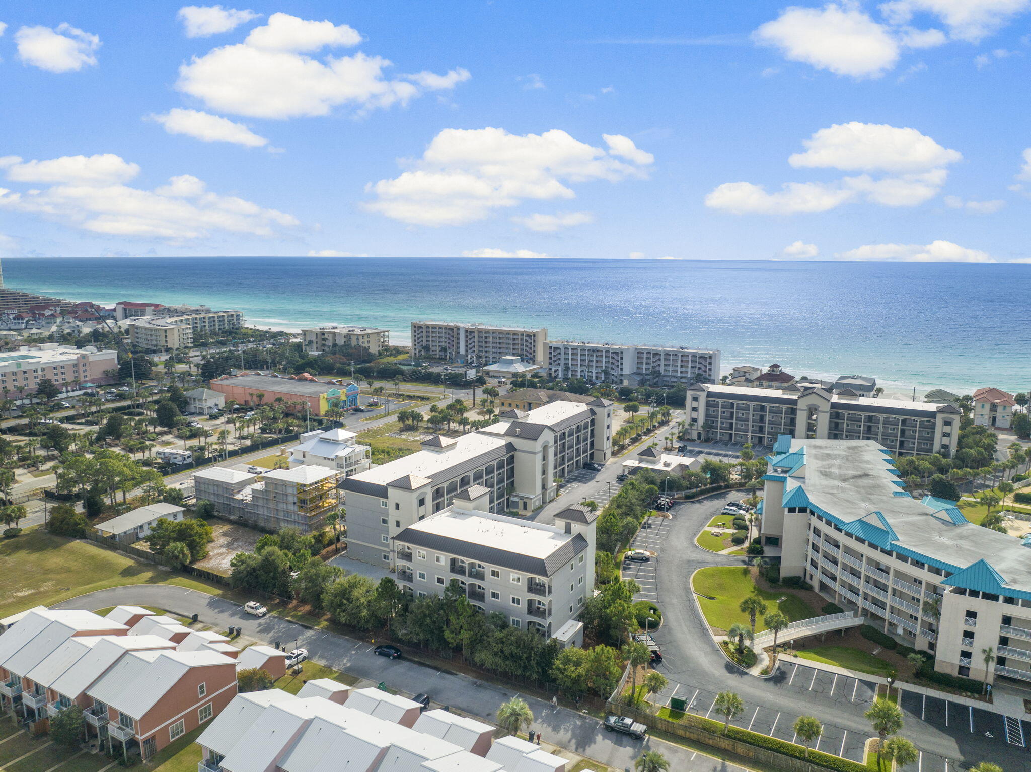 Indulge in coastal luxury with this fully remodeled 2-bedroom, 2-bath condo in Miramar Beach's desirable Alerio complex. This 995 sq. ft. ground-floor unit offers an open-concept layout with 9-ft ceilings, crown molding, hardwood flooring throughout, and tile in the bathrooms. The kitchen and baths are adorned with granite countertops and stainless steel appliances. The master bath features a sleek walk-in shower, while the guest bath includes a tub/shower combo. The private patio off the living area provides partial privacy and direct access to parking and amenities. Fully remodeled with new pieces, including beds, mattresses, and sofas, this unit is move-in or rental-ready. The gated Alerio community boasts a heated pool, 10-person hot tub, outdoor grilling area, and onsite Community Association Manager (CAM). With beach access just West of the entrance, this condo offers the perfect blend of convenience and relaxation. Priced at $550,000, this income-producing property is ready to welcome its next owner.