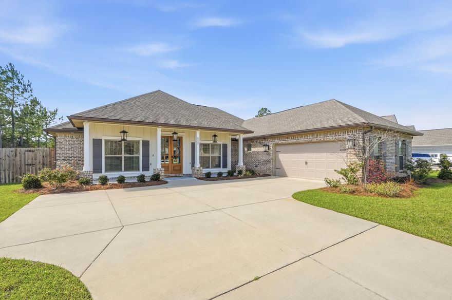 Nestled in Whitley Estates, a well maintained community in the heart of Pace, this home offers a low HOA and convenient access to shopping, dining, medical facilities, and NAS Whiting Field.From the moment you step through the custom double mahogany front doors, it is clear that 6297 Howie Way is something special. Meticulously maintained and thoughtfully designed, this 2,540 sq ft, 4 bedroom, 3 bath home blends elevated finishes with the warm, unhurried lifestyle that makes Pace one of Northwest Florida's most desirable communities.The open floor plan feels expansive from the start, anchored by 10 foot ceilings in the living and dining areas and continuous EVP flooring that flows seamlessly through the main living spaces and primary suite. Smooth textured walls, custom window and door casings, two piece and crown molding add architectural character well beyond builder grade. A 42 inch gas fireplace creates a cozy focal point, while a built in desk with granite top and a floor outlet makes working from home both functional and comfortable. 

The kitchen is equally suited for everyday living and entertaining. It features Samsung appliances, including a split gas cooktop, Energy Star dishwasher, built in microwave, and wall oven for true double oven convenience. A spacious walk in pantry offers abundant storage, while soft close cabinetry, granite countertops, under cabinet lighting, and a subway tile backsplash bring both style and function together. The oversized island is prewired for pendant lighting, and a cozy breakfast nook completes the space.

The primary suite is a true retreat, highlighted by tray ceilings in both the bedroom and en suite bath. The bathroom features a large tiled shower with frameless glass, a separate soaking tub with tiled surround, and dual vanities, each paired with its own walk in closet, creating a space designed for both comfort and ease.

A split floor plan places the secondary bedrooms away from the primary suite, offering privacy for guests, family, or a dedicated home office. Everyday functionality continues with a built in mud bench off the garage entry and a laundry room with utility sink.

The Connected Home package includes smart light switches, Ring doorbell and outdoor camera, smart thermostat, smart garage door opener, and a SmartThings hub, all easily controlled from your phone.

Situated on a generous half acre lot, the outdoor space is just as impressive. A screened back porch with a beautifully stained V groove pine ceiling, echoed on the front porch, creates the perfect place to relax. The fully privacy fenced backyard offers endless possibilities, whether you envision a pool, garden, or play space. Additional exterior features include LED recessed lighting in the front eaves, custom shutters, Low E windows for energy efficiency, irrigation system, ridge vents, and a hip roof.

Meticulously maintained and loaded with signature level upgrades, 6297 Howie Way is a rare opportunity to own a truly elevated home in one of Pace's most sought after communities.

Schedule your private showing today.