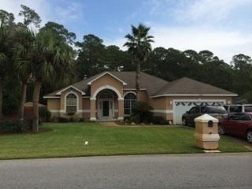 This lovely home in Biscayne Pointe is close to the beaches of Navarre, shopping, and Hurlburt Field AFB. A beautiful 3 Bedroom, 2.5 Bath, plus optional 4th bedroom/office/study or library with built in bookcases. Split bedroom floor plan stucco home. Deeded access to Santa Rosa Sound, beach area, gazebo and underground utilities. Large tiled florida room overlooking the large back yard. In the spacious living room you will find a tiled gas fireplace, plant ledges, and a breakfast bar that wraps around in to the kitchen. All appliances convey. A stainless refrig with bottom drawer freezer, gas stove/oven, HE washer and dryer, new garbage disposal, new deep kitchen sink and new faucet, new under sink water filter system. Master bath 2 walk in closets. Buyer to verifly all sqft and data.