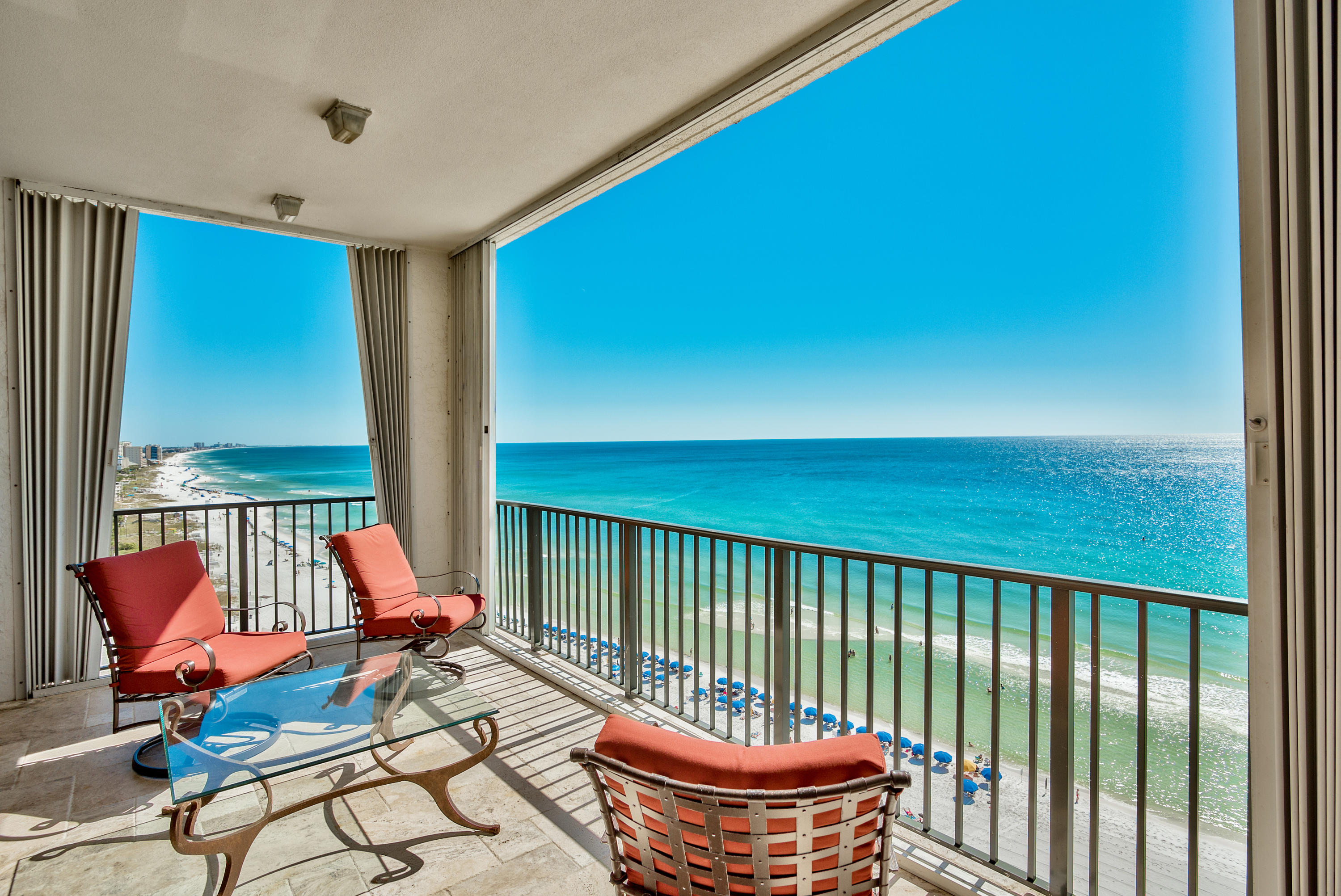 PENTHOUSE residence in exclusive rental restricted development. Enjoy a coveted location on the ''world's most beautiful beaches''. Stunning 12th floor condo spans across 60ft. of gulf front and features over 4,000 sq. ft. of indoor and outdoor living space. Cleverly redesigned and ideal for both second homes and full time residents. You will appreciate the solid construction and attention to detail in this home: wood and stone flooring, solid wood trim and moldings, soaring ceilings and walls of windows. Thoughtfully styled with classic design and luxurious touches. Presented fully furnished, with accessories and custom linens included. Well-appointed Master Suite boasts panoramic gulf views, fireplace, custom built in cabinetry and large walk-in closets.