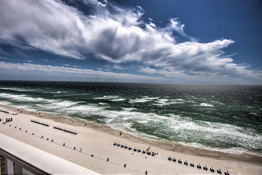 RENTAL MACHINE! Stunning beach-chic style adorns this fully-furnished condo with two masters. Relax on your 13th floor XL balcony with only the sound of seagulls and surf, as you watch parasailers and boats in the Gulf. Light and bright throughout with floor to ceiling windows! Recently renovated kitchen with stainless steel appliances and granite countertops, new bathrooms, and new flooring throughout. Long Beach Resort offers a lagoon-style pool overlooking the Gulf, 2 heated pools, pool-side restaurant/bar, fitness room, and more! Turn-key furnishings mean you can move in or start a rental program immediately. Gross rental income for 2016 was $47,338 and 2017 was $49,656! Fees include security, cable, internet, water, sewer, and trash.