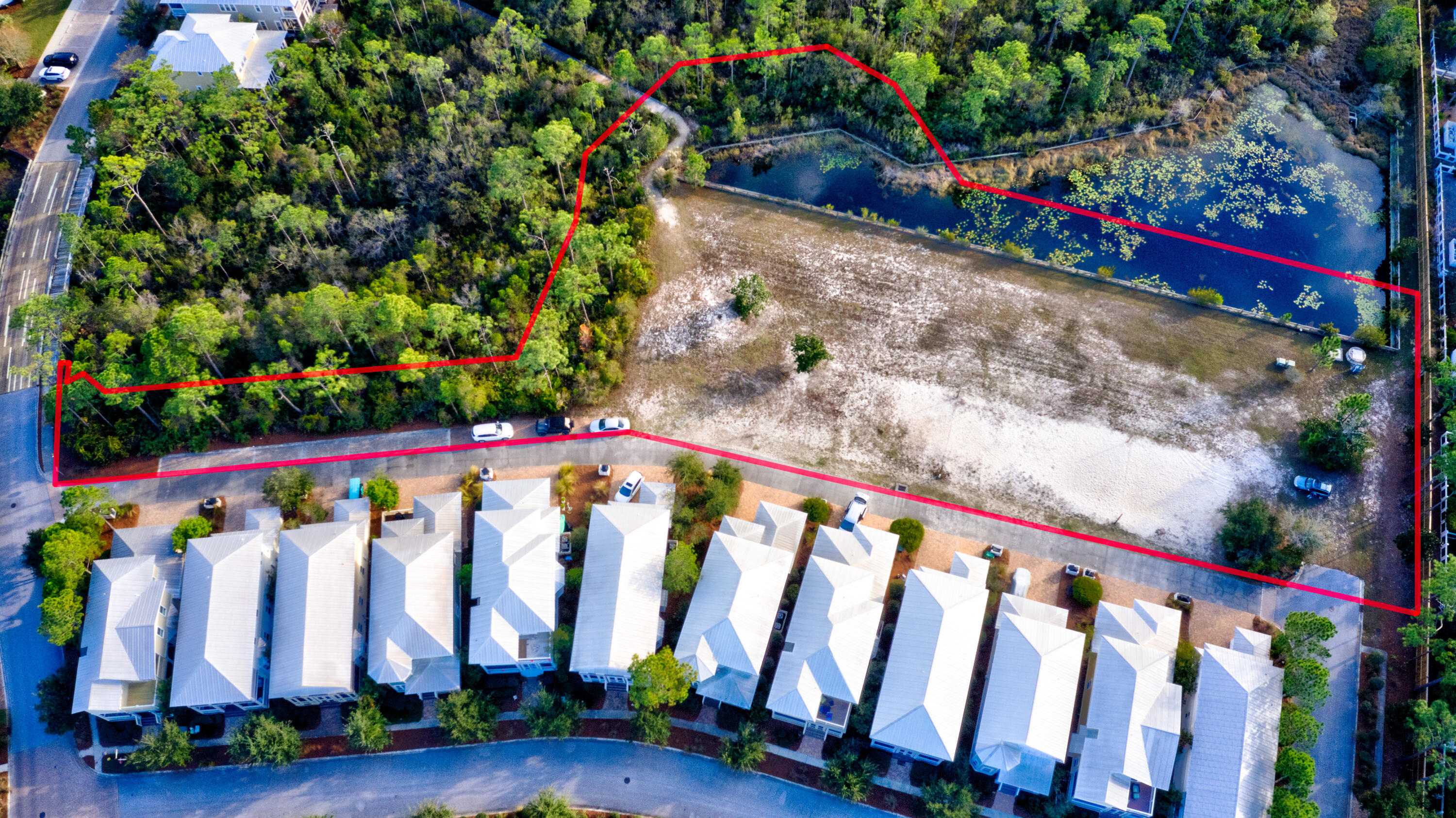 Great location to be developed or used as a personal estate. Just a short bike ride To the Gulf of Mexico, Restaurants, shopping and loads of fun.. Owner has option of joining Nature Walk HOA. This property is part of a CD with ongoing CDD association fees property is owned mixed use.