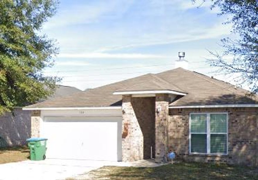 3/2 featuring fenced back yard, open floor plan, 2 car garage,