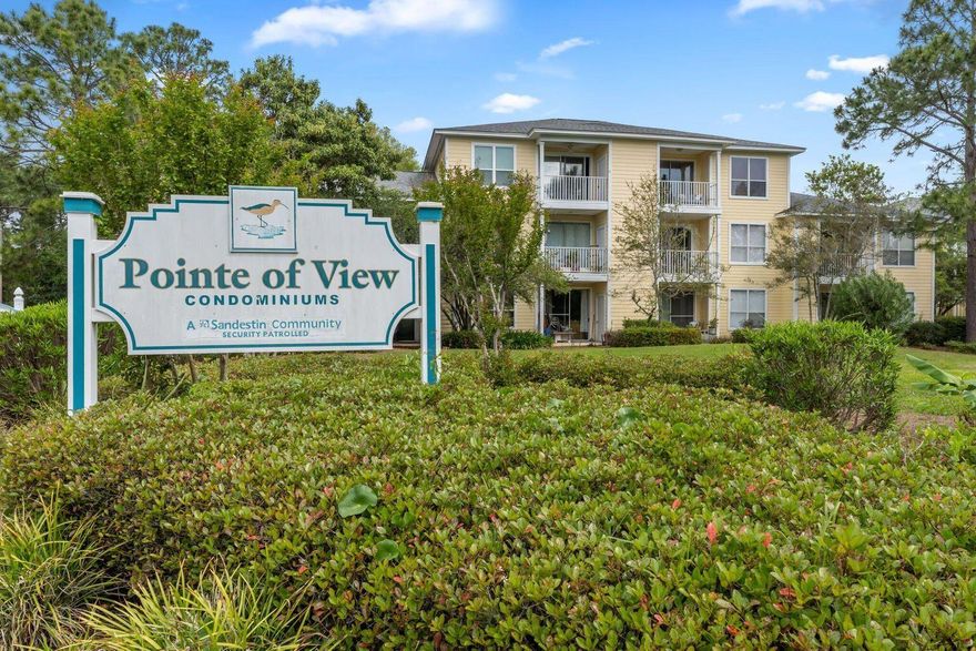 HUGE PRICE DROP!  Perfect investment property or full-time residence. The Pointe of View condo complex is ideally located near the Gulf of Mexico beaches and Choctawhatchee Bay, shops and restaurants at Grand Boulevard, Sandestin Golf and Beach Resort and Sacred Heart Hospital.  Very RARE FIRST FLOOR condo that backs up to beautiful greenery.  BRAND NEW CARPET INSTALLED. This condo has an updated kitchen with new soft close cabinets, granite and new appliances.  Enjoy your tranquil balcony overlooking gorgeous trees.   Pointe of View owners have the use of the outdoor community pool and fitness center. The condos at Pointe of View are an investors dream and can be enjoyed by full time residents, long term tenants and short-term renters.