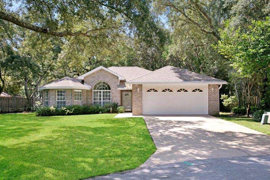 BACK ON THE MARKET AT NO FAULT OF THE SELLER. Situated on a quiet cul-de-sac, in the popular gated community of Parkwood Estates, this charming home offers an inviting atmosphere. Boasting a stylish brick exterior, the house exudes a timeless appeal. As you approach the front entrance, you are greeted by a well-maintained lawn and manicured landscaping, adding to the curb appeal of the property. Upon entering, you are welcomed by hardwood floors into a spacious and thoughtfully designed interior. The spacious floor plan creates a seamless flow between living areas, making it ideal for both comfortable living and entertaining guests. With two living areas, separated by a pocket door, there is plenty of space for everyone to enjoy. The home features a fully equipped kitchen with sleek