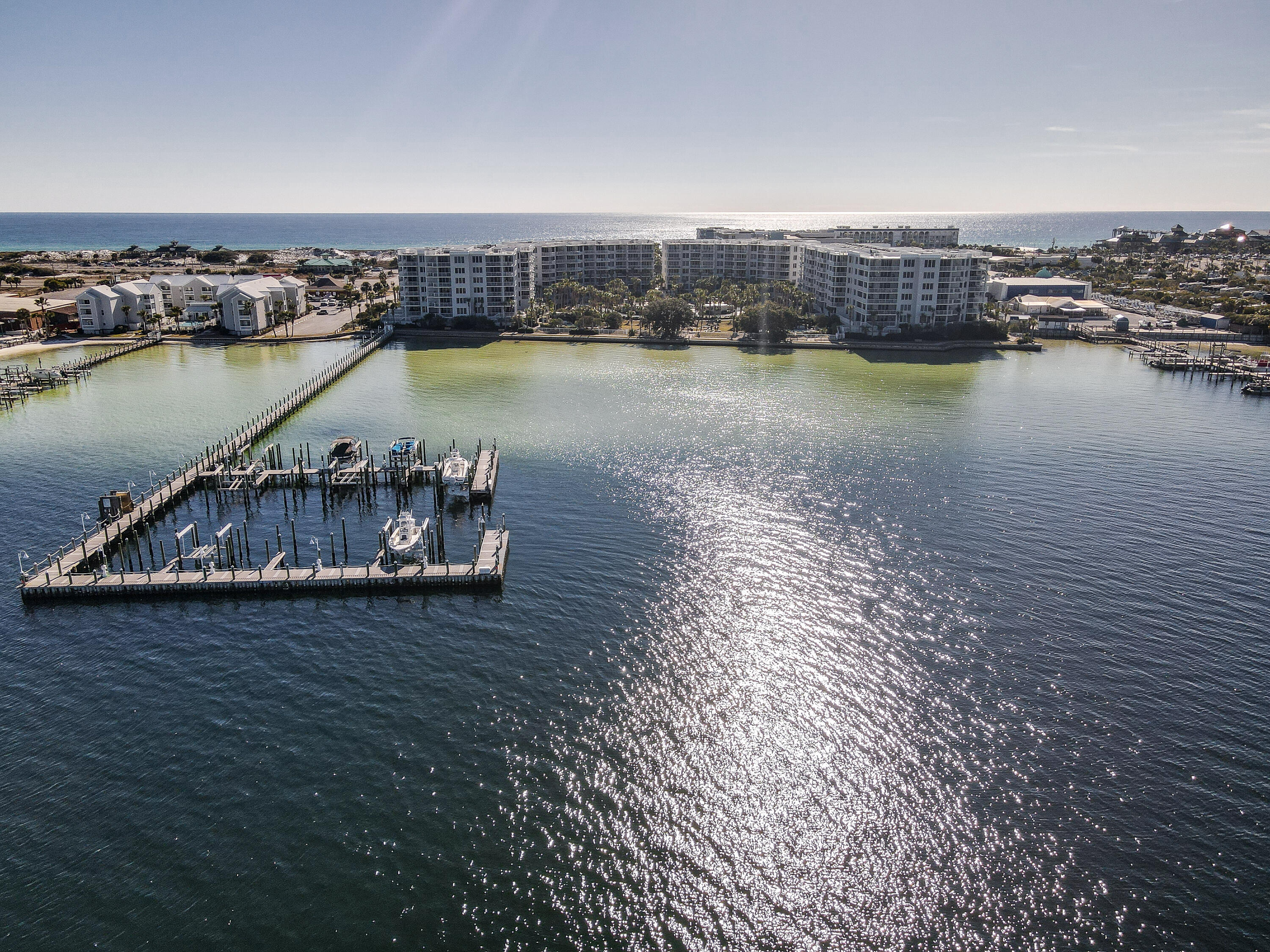 Capture your private little piece of paradise in 2023 with this turn-key condo AND BOAT Slip. This Vacation Condo shows pride of ownership through timely and professional maintenance and management. This unit is offered furnished and with everything needed to add it to your rental portfolio today. The unit boasts an open floor plan featuring three bedrooms. Enjoy accessing the extra large waterview balcony from the living area and the main bedroom. The complex offers a host of recreational opportunities including beach AND bay access. Or spend the day relaxing in the lazy river. The seller will participate in a 1031 exchange timeline and requests the same of the buyer. This unit is on the rental market and will require a showing appointment. Virtual Walk-Through available in the images.