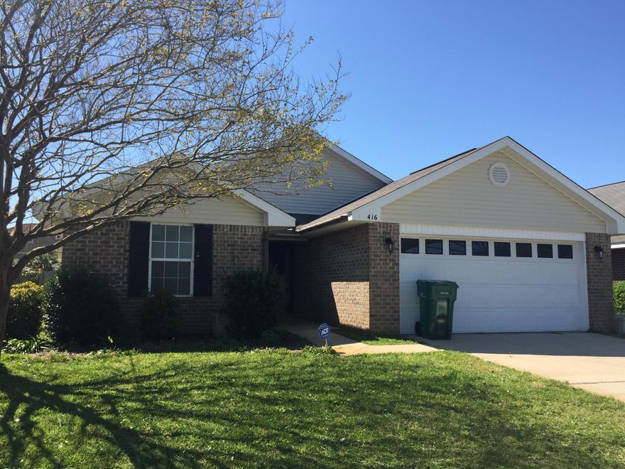 New Roof! Just installed in December 2017. This home boasts a split bedroom plan with updated tile floors throughout. The master suite includes an updated bathroom that has a beautifully tiled walk in shower, and double vanities. All new stainless steel appliances in the kitchen! From the kitchen the breakfast bar opens up to the dining and living room where there are tall vaulted ceilings that make the area feel so much bigger. Outside you'll enjoy sitting in the large screened in porch and privacy fenced back yard.