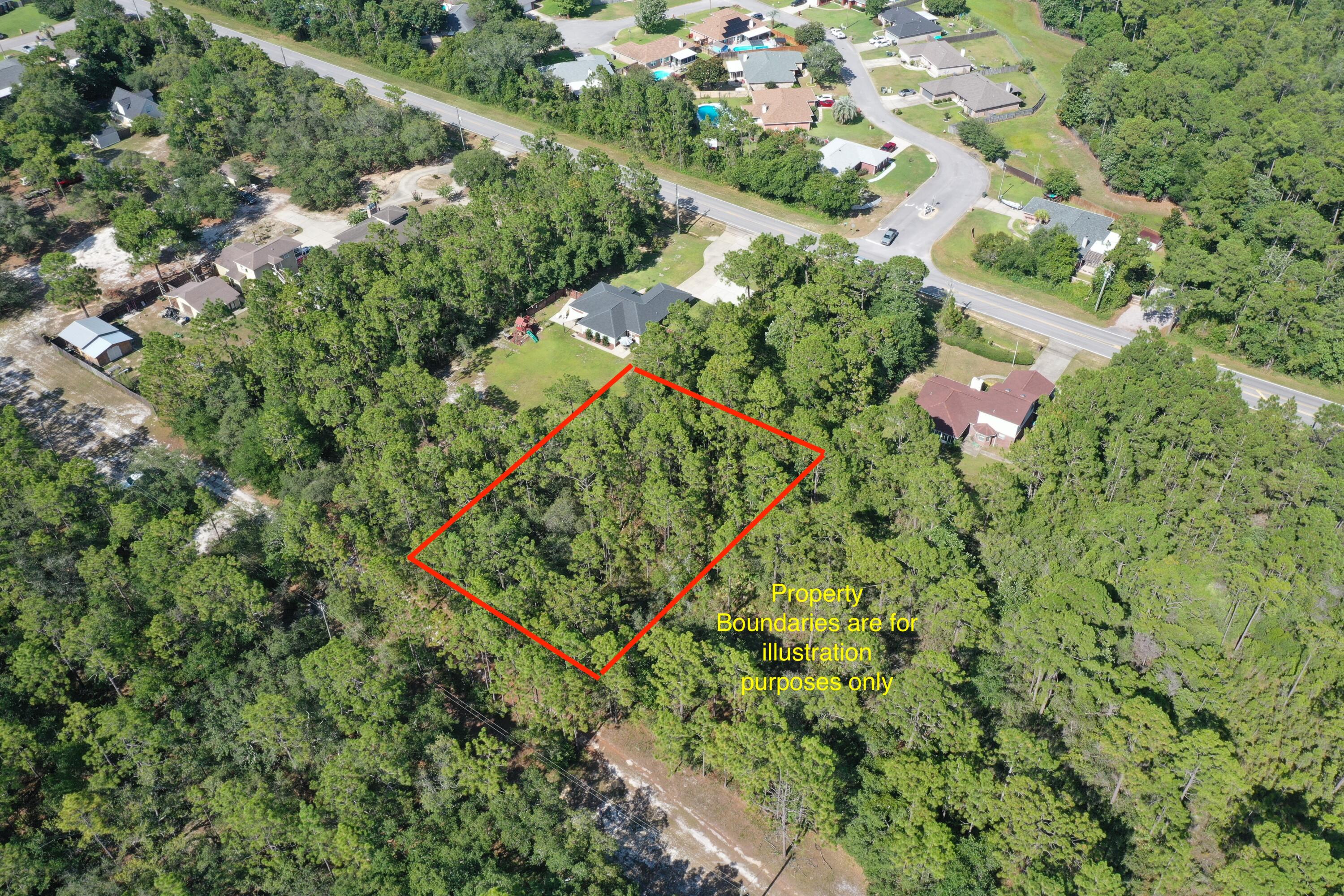 This large wooded flat lot with a little privacy may be just for you! This property measures out to be about 100 feet wide and 170 feet deep (measurements approximate) and totals 0.4 Acres. Ready to be brought to life! Owner financing options available!
