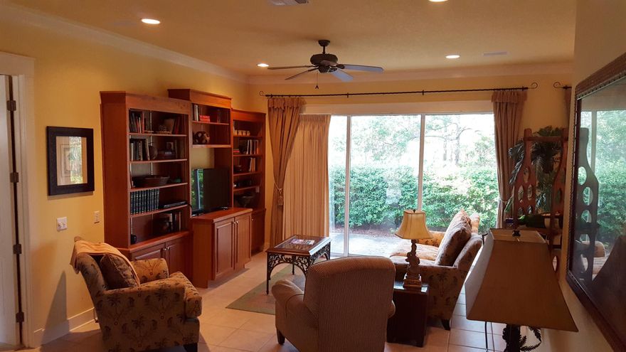 LOWEST PRICE IN GATED GOLF COURSE COMMUNITY OF REGATTA BAY.OWNER READY TO SELL. Get two homes with a pool for the price of one. This 3 BR/3BA home features a smart floorplan offering one living area with new granite countertops throughout; stainless steel appliances & cherry wood cabinets in kitchen opening into living area with built-in cabinetry overlooking a nature preserve. The master bedroom opens onto the pool courtyard and master bath offers granite double vanity; garden tub and separate shower. The guest bedroom opens onto the pool courtyard as well and has built-in cabinets which can be used as a home office. The second living area is a cabana also opening onto the pool courtyard with bedroom; full bath; sitting area and morning kitchen with sink and fridge. Sold fully furnished.