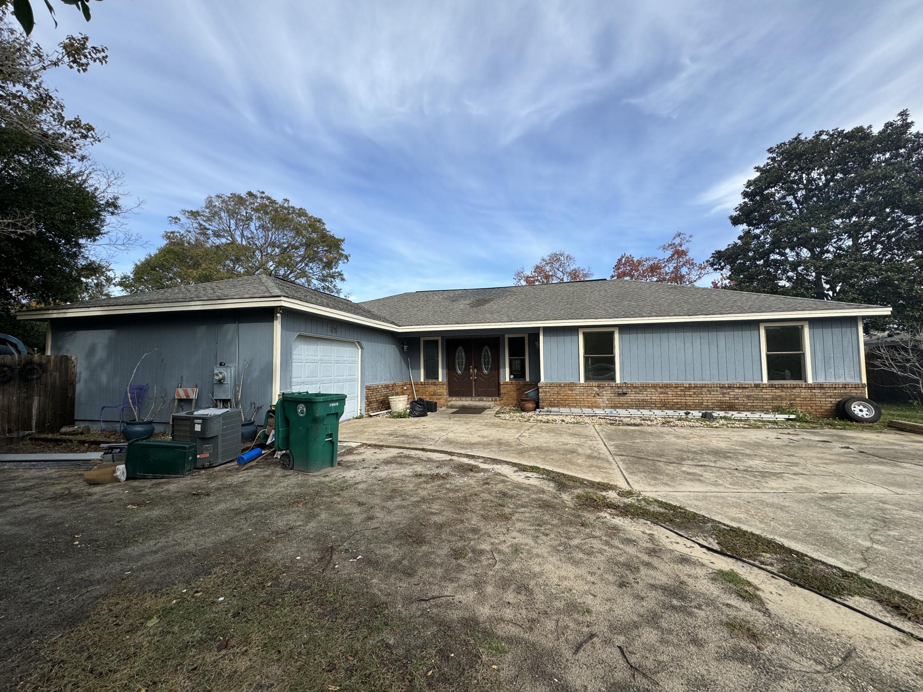 This Destin gem, though in need of a little TLC, presents a golden opportunity for those with a vision for transformation. Priced accordingly, this fixer-upper boasts unparalleled potential, with its fantastic location, expansive lot, and generous living space just waiting to be revitalized.Nestled at the end of a tranquil cul-de-sac, this 3-bedroom, 2-bath residence invites you to reimagine the possibilities. The right side of the home houses all three bedrooms, including the primary with its own en suite, while a spacious living room and an enclosed Florida room create welcoming spaces for relaxation.On the left side, discover an office/flex space and a kitchen designed for culinary creativity. The eat-in kitchen features newer stainless appliances and an island, promising a