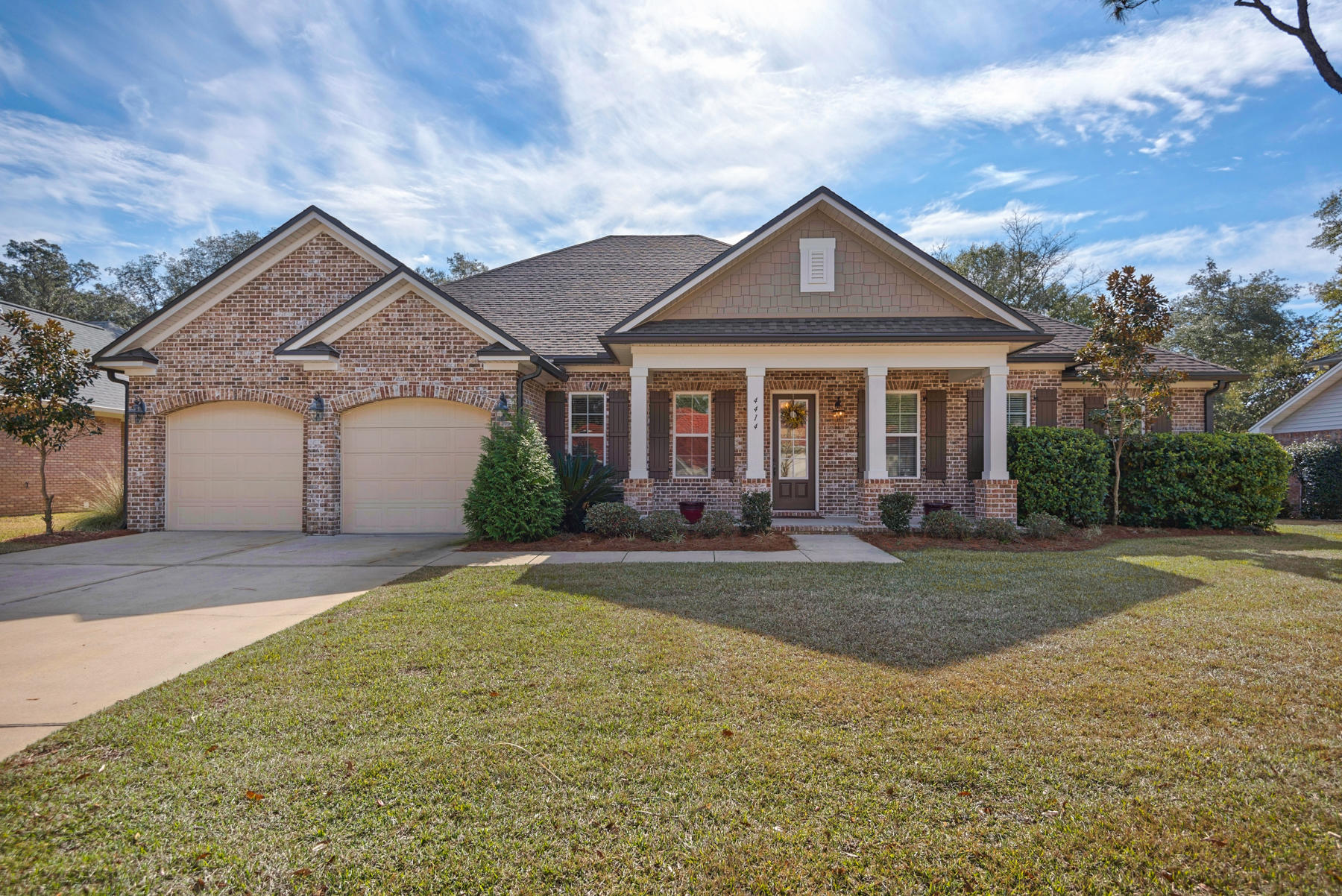 Among the newest homes in Southwind at Bluewater Bay. Bluewater Bay is the only resort style community North of the Bay and all while being zoned for extremely desirable Bluewater Bay Elementary and Niceville High School . This Randy Wise Home is a well finished home on the Marsh's 3rd Tee box. The exterior boasts brick, arches, columns and an oversized covered rear porch. The interior of the home has ten foot ceilings, wood floors, deluxe cabinetry and custom mill work. Large Master Bedroom with sitting area and access to porch. Double vanity in master bath, two walk in closets, tiled walk in shower and soaking tub. A true 4/3 with an additional office which could be used as a bedroom and a formal dining room. A very rare opportunity and a must see in Bluewater Bay.