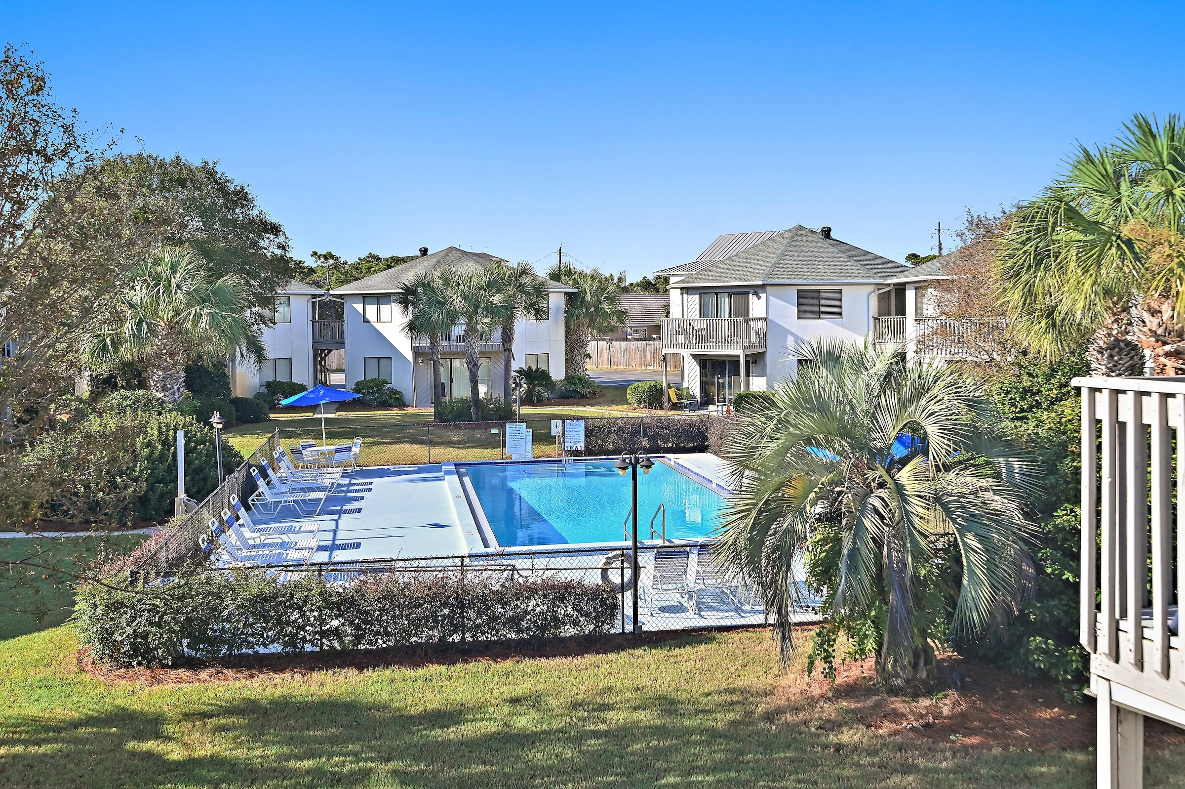 This top floor and fully furnished unit at Crystal Village located just 2.5 blocks from the spectacular South Walton beaches and Pompano Joe's beachfront restaurant!  Never miss a sunset with a spacious private deck overlooking perfectly manicured grounds and a community pool, one of two at Crystal Village. This unit is the perfect vacation rental as the second bedroom includes bunks and an owner's closet as well. Crystal Village is perfectly located between Scenic Hwy 98 and the main Hwy 98, with easy access to all of the restaurants, shopping, and of course the world class beaches that this area is famous for! Come take a look. Roof was replaced in 2023. Buyer to please verify all information contained herein.