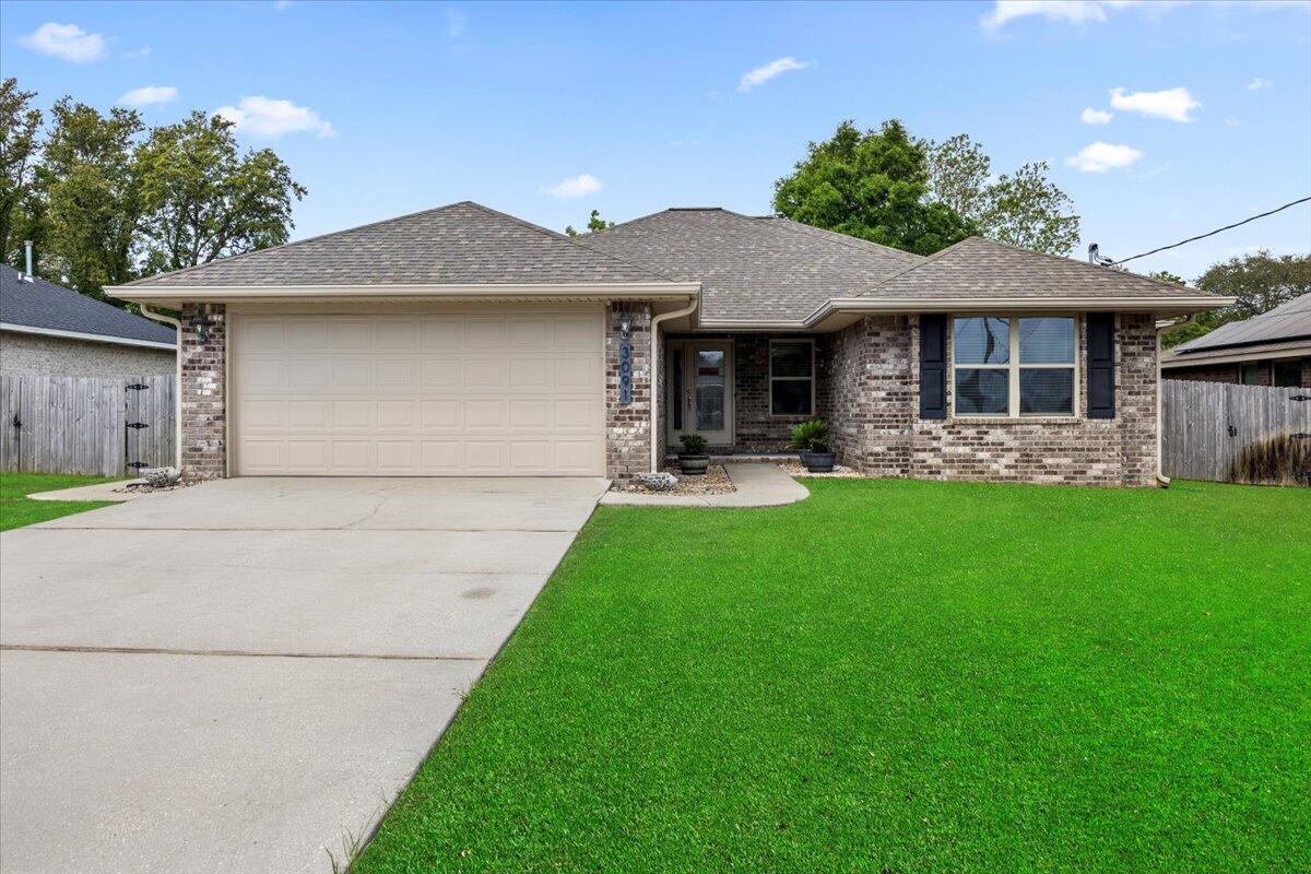 MOTIVATED SELLER!!! Located in the heart of Gulf Breeze, this 4/2 brick home, with no HOA, offers everything you've been searching for. Enjoy charming outdoor spaces with a covered front and back porch, along with a large wooden deck perfect for entertaining. The home has had the interior walls repainted, vinyl plank flooring throughout excluding the bedrooms which has carpet. Carpet not your thing? No problem, seller is offering up to a $2,000 flooring allowance. Other home features include bull-nosed corners in the formal areas, 5 1/4' baseboards, rocker switches, elongated toilets, and a 50 gallon water heater. Relax with family and friends in the generously sized living room with 10 foot ceilings, back yard access door, and opens up to the dining room.The primary suite is a true retreat, featuring a tray ceiling, sitting area, oversized walk-in closet, 5' walk-in shower, corner garden tub, and double vanity.The kitchen is a culinary dream with granite countertops, cream cabinetry with hidden hinges and crown molding, a breakfast bar, stainless steel appliances, recessed lighting, spacious pantry, and a bright window for natural light. Don't miss your opportunity to make this beautiful house your next home! Buyer is responsible for verifying all data and information including lot size and room measurements as it is deemed to be reliable but not guaranteed.