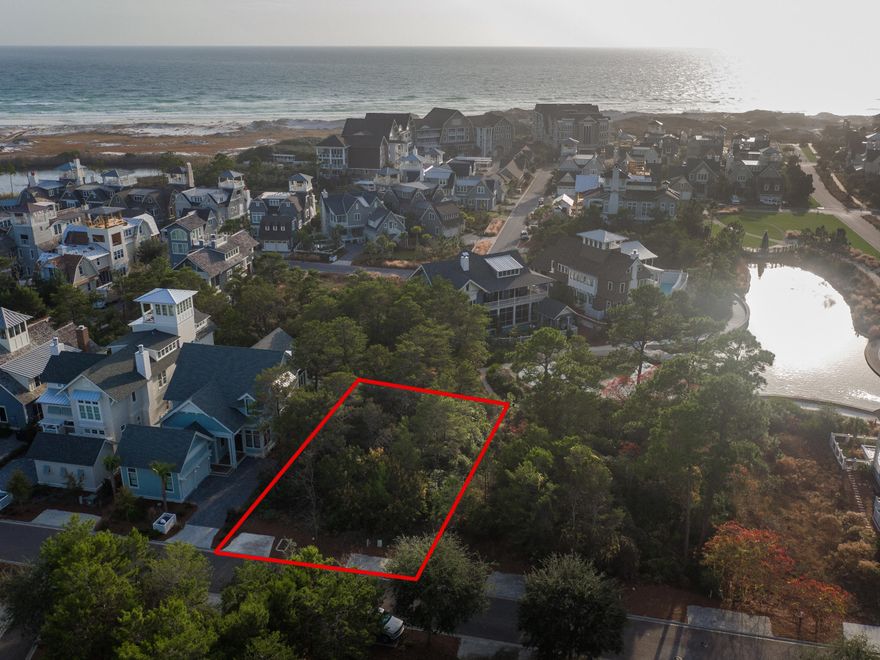 A very special home site in the gated community of Watersound Beach. Situated on the Yacht Pond, this lot backs to a peaceful green space and beautiful pond making this lot perfect for those seeking refuge in a private, gated neighborhood. A home on this lot will enjoy gulf views from a third floor tower as well as accommodate a nice size house on the foot print. Enjoy all the resort style amenities that WaterSound Beach offers, including a mile and a half of pristine private beach, multiple swimming pools, boardwalks leading to the sea, a puttering park, tennis and so much more.