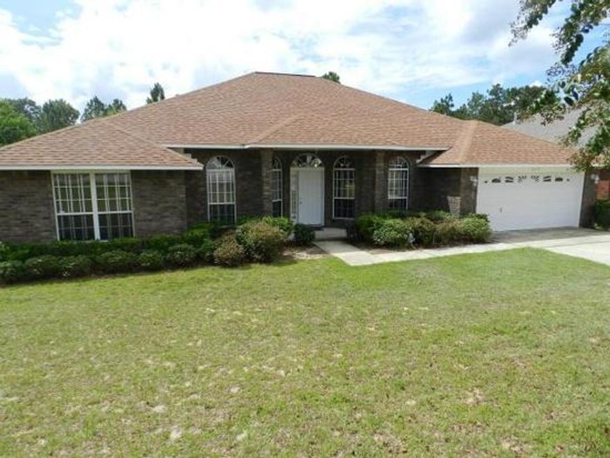 Split floor plan, large living area w/fireplace, formal dining, eat-in kitchen, granite counters, lots of cabinet space, Island, pantry, laundry room. Large recreational room for family fun, jack and jill bathroom off the rec room is shared with additional bedroom. Spacious closets in all rooms. Large Master bedroom, his and hers closets with separate shower and garden tub. There are no compromises for space or location in this lovely home. Make an appointment to see this home today, it is not going to last long!