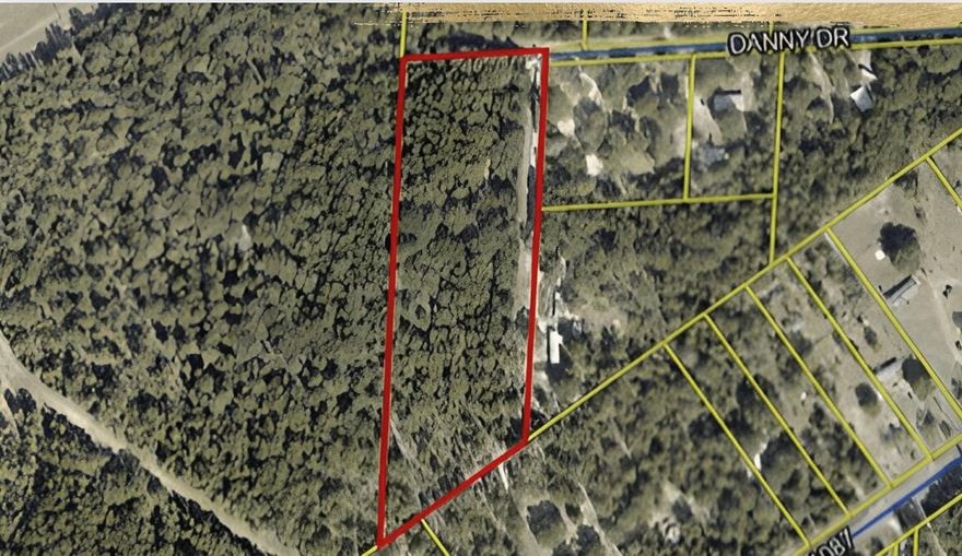 Approximately 6 acres with an existing mobile home built in 1997. Property conveys as-is and is priced primarily for land value. Buyer to verify all information, contact listing agent for all showings.