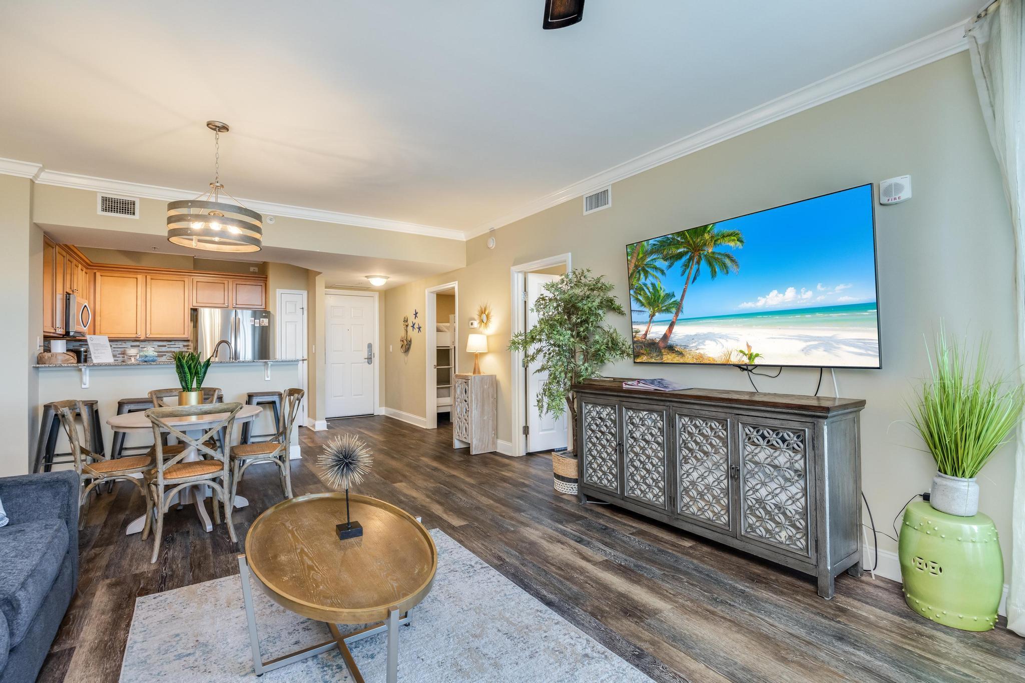 Step inside to an open-concept living space that flows effortlessly from the granite-accented kitchen--complete with an eat-in breakfast bar--to the spacious living room, which opens up to a private balcony perfect for enjoying sunsets over looking the Gulf of America. The primary bedroom also features direct balcony access.The second bedroom includes built-in bunk beds and a private en-suite bathroom. With in-unit laundry and plenty of space to unwind, this condo is as functional as it is stylish.Located in a resort-style community, you'll enjoy a wide range of amenities including: A bistro and coffee shop, Event space for gatherings, Resort-style pools, hot tub, and a kids' splash pool, Outdoor grilling and social area, Tennis courts and a playground. Centrally located, you're just minutes from the Morgan Sports Center, public beach access, shopping, dining, and an array of entertainment options.