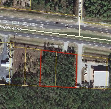 1.2 acre parcel on Hwy 98 just east of the intersection of Hwy 98 and 30A, 240' of road frontage, zoned VMU, great parcel for commercial development