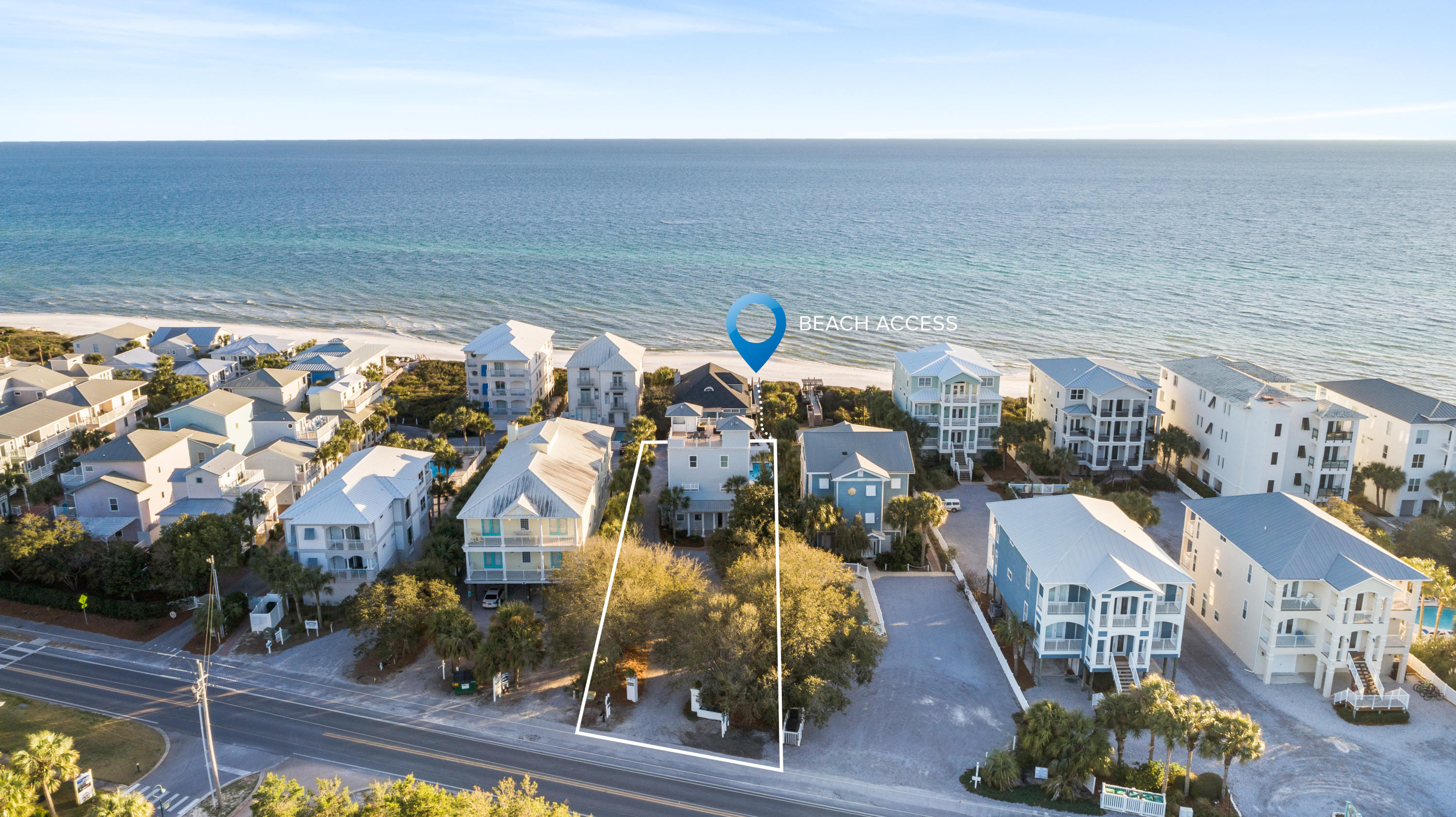 This beautiful 6 bedroom, 5 bath beach home has amazing panoramic views of the Gulf of Mexico and sits on an oversized lot that is just one back from the beach in the heart of Seagrove! This coastal residence is being offered fully furnished and comes complete with a spectacular rooftop deck including a built in bar & grill!  Features include a first floor mother-in-law suite, an open concept living, kitchen and dining room layout, hardwood floors, quartz countertops, built in bunk beds and updated bathrooms with frameless glass doors!  The private, heated pool & deeded beach access help to make this the ideal 30a beach home!