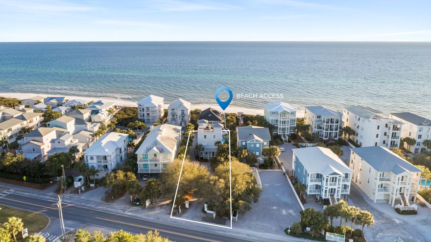 This beautiful 6 bedroom, 5 bath beach home has amazing panoramic views of the Gulf of Mexico and sits on an oversized lot that is just one back from the beach in the heart of Seagrove! This coastal residence is being offered fully furnished and comes complete with a spectacular rooftop deck including a built in bar & grill!  Features include a first floor mother-in-law suite, an open concept living, kitchen and dining room layout, hardwood floors, quartz countertops, built in bunk beds and updated bathrooms with frameless glass doors!  The private, heated pool & deeded beach access help to make this the ideal 30a beach home!