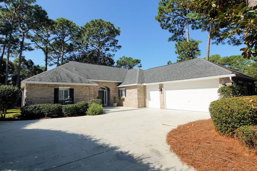 Pride of ownership is evident in this Bluewater Bay all brick, single story home. Located in the gated community of Southwind. The open concept floor plan has eight inch baseboards, crown molding and custom built-in shelving. Kitchen features tall white cabinets with glass doors, stainless appliances and granite counter tops. The split floor plan includes a large master bedroom and master bath. Master bath features dual sinks, Jack and Jill closets, walk-in shower, garden tub and an attached bonus room that could be a great office/gym/nursery or more storage. LVP plank flooring thru-out home. Well manicured yard with open views from many of the rooms. Oversized garage with work bench, sink, and golf cart storage. Roof 2007, Heat and a/c 2006.