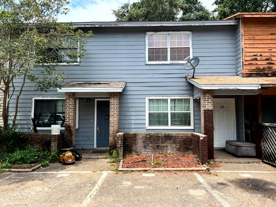 Explore this recently updated 2 bed, 1.5 bath townhome nestled in an Opportunity Zone in Fort Walton Beach, offering potential tax benefits. Each room has been thoughtfully modernized, showcasing tile floors throughout that seamlessly blend durability with style. The home provides a unique blend of comfort and convenience. Its location places you within close proximity to key installations such as Eglin AFB, Hurlburt AFB, and 7th Group Special Forces, making it a strategic choice. This property embodies an excellent balance of location, design, and potential for financial benefits. Act now to make this attractive townhome your own, while enjoying the vibrant, yet relaxed Florida lifestyle. Unit next door 33 is also available if you are looking for rentals side by side.