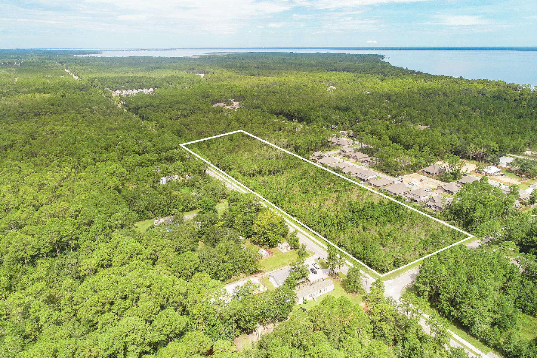 With almost 1300 linear feet of road frontage, this parcel offers a wide variety of land use options. Zoned Neighborhood Infill, the county advises 2-8 units per acre could be built depending on the structure type. Parcels this size are few and far between in this area so act fast! **Buyer to verify all information to their satisfaction.