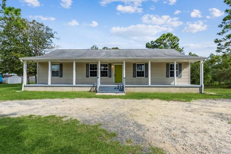 Picture yourself enjoying your morning coffee on this wonderful front porch! This 4 bedroom, 2 bath home sits on 1.56 acres just outside of town. It has a great location with a short commute to the heart of Crestview and I-10. This split bedroom floor plan allows for everyone to have their own space but also offers a cozy feel as the living/dining/kitchen flow together. The laundry room just off of the kitchen open to the back porch and to the incredible back yard! The oversized shed is ready for you to make it your own. Buyer to verify all information deemed important including lot size, room dimensions, etc.