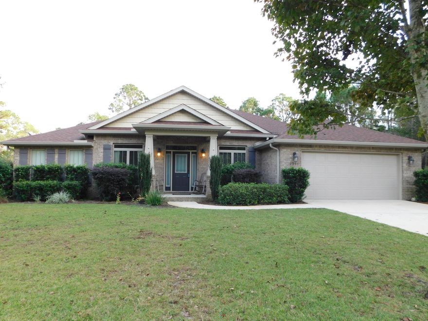 MOVE-IN-READY! 4 Bedrooms, 3 Full Baths PLUS Office, a Formal Dining Room AND a BONUS ROOM! Nearly 3100sf inside with an Oversized 2 Car Garage, a Covered back porch and Underground utilities! Located on a .82 Acre Lot with Holley By The Sea Recreation Center Benefits! This Beautiful Home has a 4th Bedroom with its own private bath - Great for a Guest Suite! The HUGE Kitchen has Granite Countertops, Stainless appliances (Including TWO Ovens!) Large step-in Pantry, Stone Backsplash, Tile Flooring and Custom Maple (Cherry Mahogany Stained) Cabinets with Oil rubbed bronze hardware. The Kitchen Breakfast Bar opens to the Great Room with Crown Molding, tall baseboards & Wood Burning Fireplace. The Bonus Room is between Great Room and Back Yard.