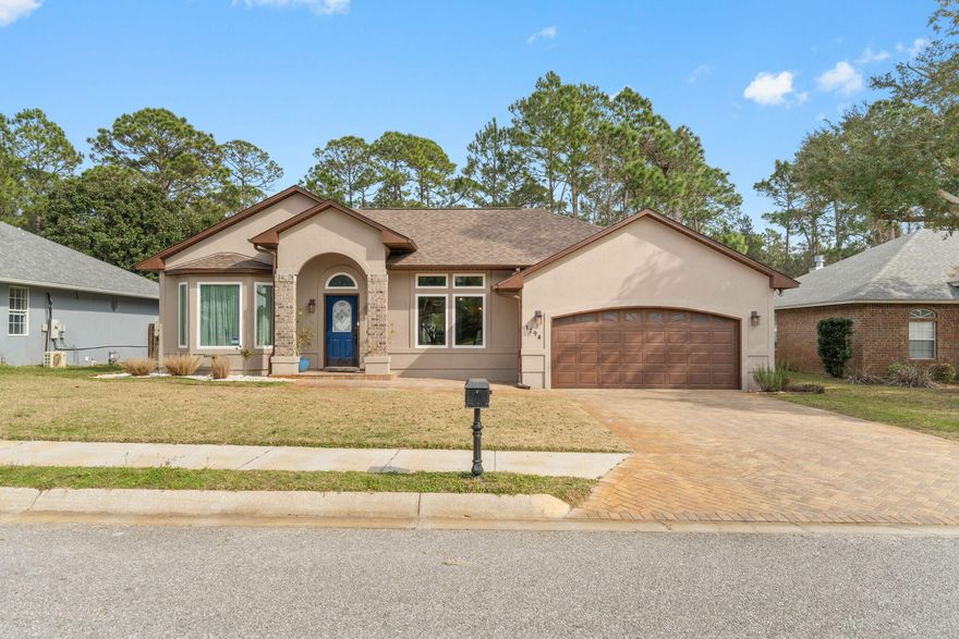 Immaculately maintained custom pool home located in desirable Sound Hammock. This 3 bedroom/2 bath home features tile floors throughout the main living areas and master suite, gas fireplace, beautiful upgraded granite countertops in the kitchen, tiled backsplash, stainless appliances, and new cabinets in the laundry room.  Step outdoors where you will enjoy the large salt water pool, spacious patio and hot tub all fully enclosed.  New roof less than 6 months old.  This community has a private path to the intracoastal waterway where you can enjoy the private beach and new pier.  Seller will pay off solar panels at closing.