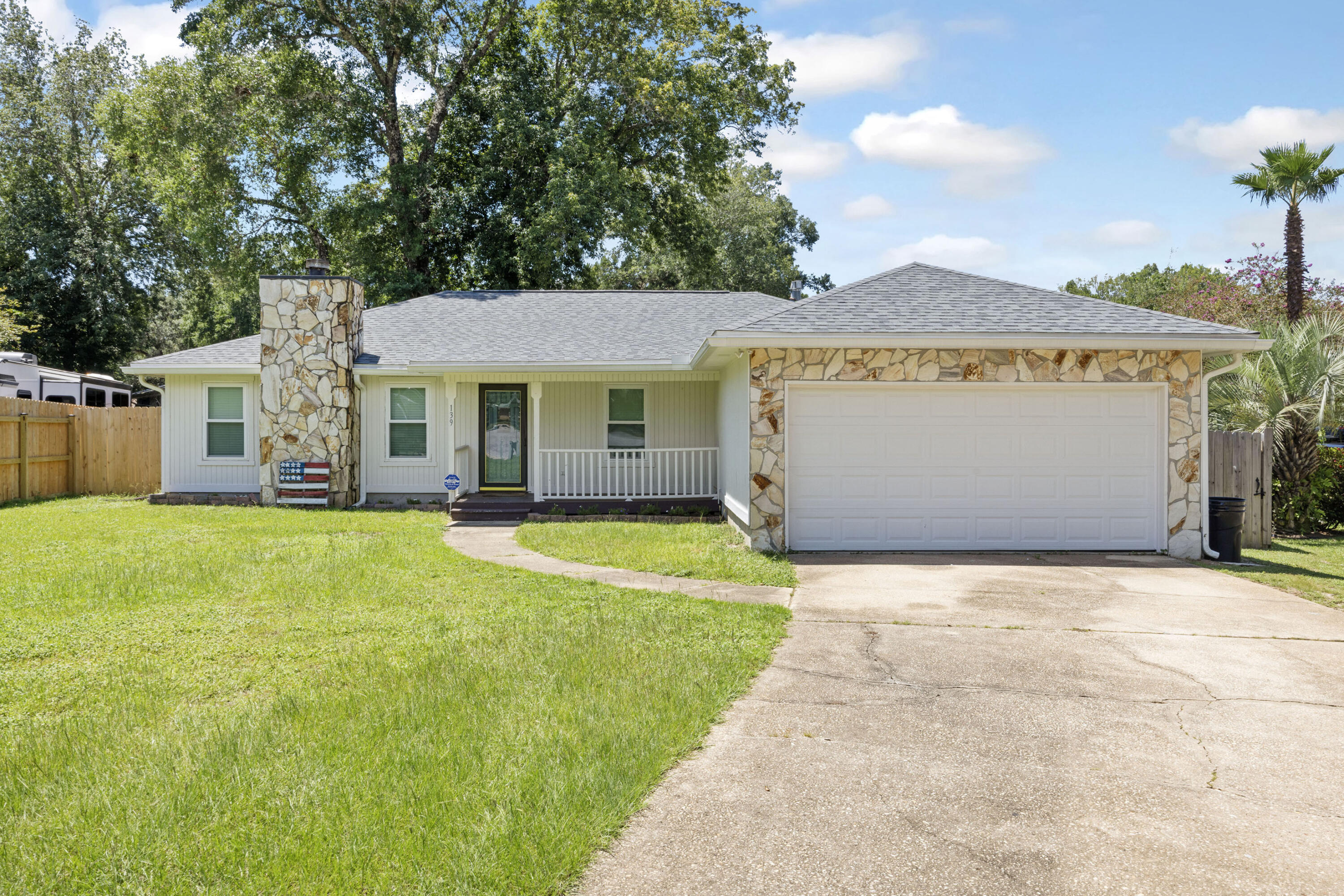 4.875% assumable VA loan available for qualified buyers! 3BR/2BA + office on a quiet cul-de-sac with 2-car garage and fenced backyard. Roof, HVAC, and water heater (2022), windows and gutters (2023), updated light fixtures, and fresh interior paint (2025), updated vinyl flooring (2025). Kitchen features dark shaker cabinets, granite counters, stainless steel appliances, and shiplap accents. Updated bathrooms with modern finishes. Primary suite has walk-in closet and private patio access. Large deck, 50 amp RV plug, and shiplap-accented laundry room. No HOA! Minutes to Destin, Eglin, and Duke Field.
