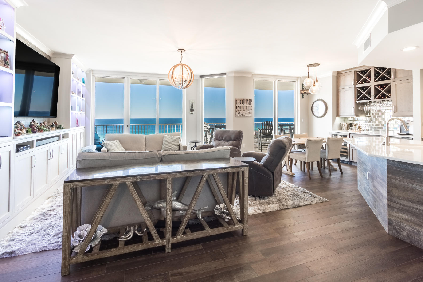 Exquisite 16th floor resort condo home with panoramic views of the gulf and bay! Professionally remodeled from floor to ceiling. All new kitchen, bathrooms, flooring, appliances, lighting etc. You will not be disappointed by the incredible finishes including quartz countertops in the kitchen, bathrooms and laundry room, beautiful tile work in the bathroom showers, new cabinetry and fixtures, lighting, built-ins and so much more! Enjoy floor to ceiling windows and a large balcony facing the gulf (accessible by the master & living) as well as another balcony facing the bay (accessible by both guest bedrooms).