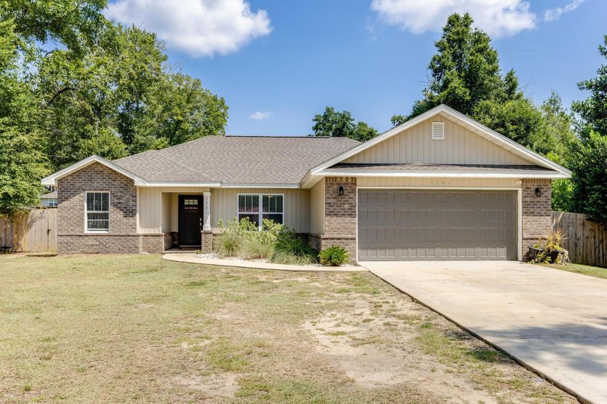 Welcome to this stunning 4-bedroom, 2-bath home, perfectly situated on a .55-acre flat lot. Built in 2021, this home offers a 2-car garage and an open floor plan that enhances its spacious feel. The heart of the home is the kitchen, featuring shaker-style cabinetry, stainless steel appliances, a smooth-top range, vaulted ceilings, and beautiful granite countertops. Luxury vinyl plank flooring runs throughout the home, offering both style and durability. The master bedroom is a true retreat, with a tray ceiling adding a touch of elegance. The master bath is equipped with a double vanity, a garden tub, a separate shower, and a walk-in closet, providing all the comforts you desire. Don't miss out on this stunning home. Schedule a showing today!