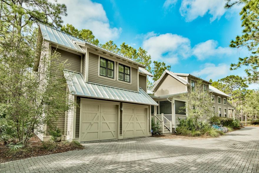 Fantastic opportunity to own in Watercolor for under 1 million! This spacious home with additional carriage house is conveniently located close to shopping and dining at Watercolor Crossing. The freshly painted interior of the main home instantly invites you in to enjoy the comforts of it's 3 bedroom, 3 bath design. Along the main level you will find an open floor that combines the kitchen, dining and living areas. The master suite is on the ground level in addition to an office nook, guest bedroom, and laundry area. Upstairs you will find a cozy bunk room and additional bath. The carriage house tops off the tour with very spacious bedroom/kitchen combo with an additional bath. The murphy bed folds up for additional space. The exterior of the home boasts exceptional parking space with it's