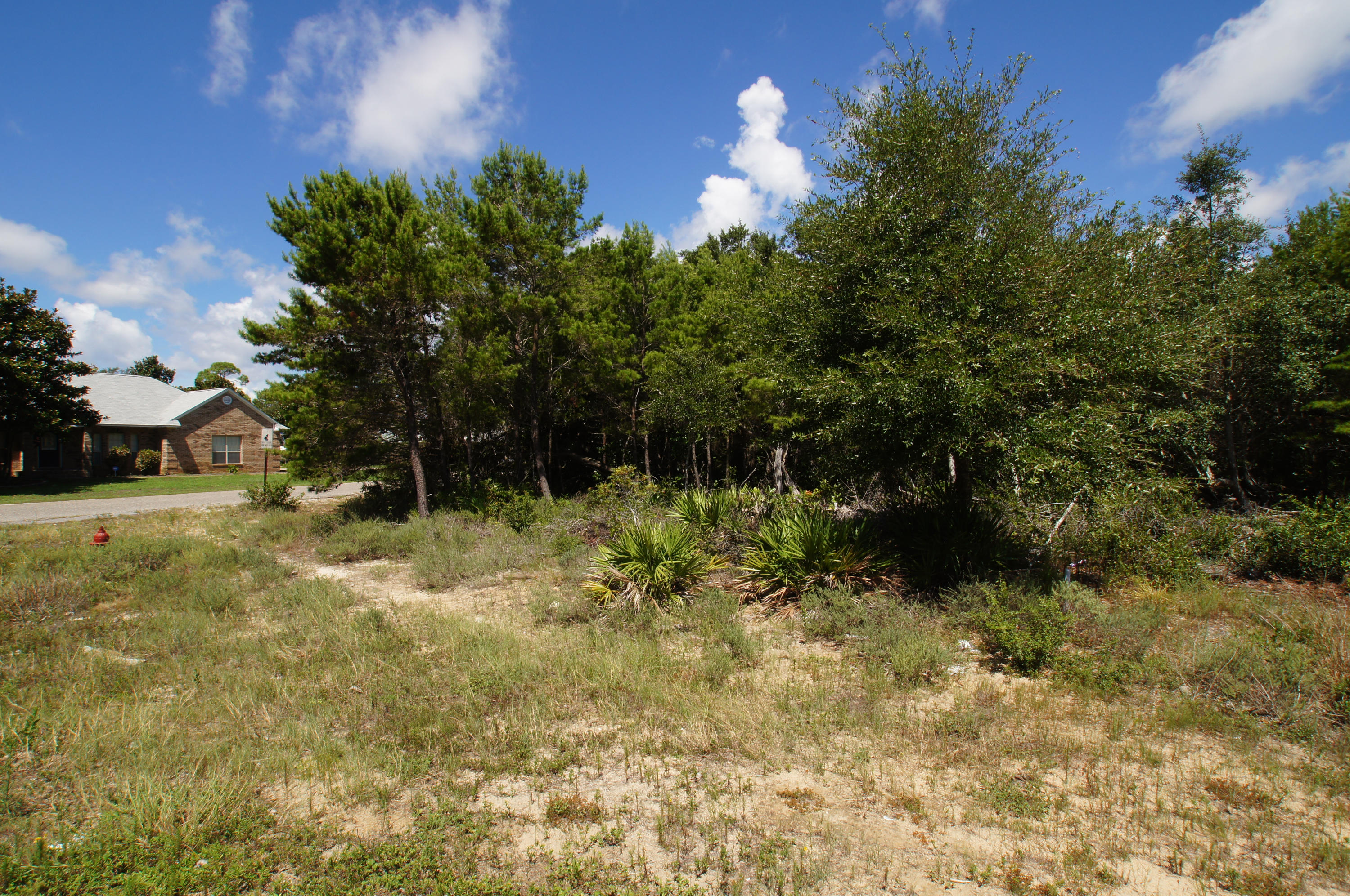 A nice lot just across the street from the sound. The perfect place to build your water view home! A great neighborhood which offers deeded access to the Sound/Intracoastal Waterway. Located towards the end of the neighborhood and is very quiet and peaceful. Great opportunity to build your dream home.