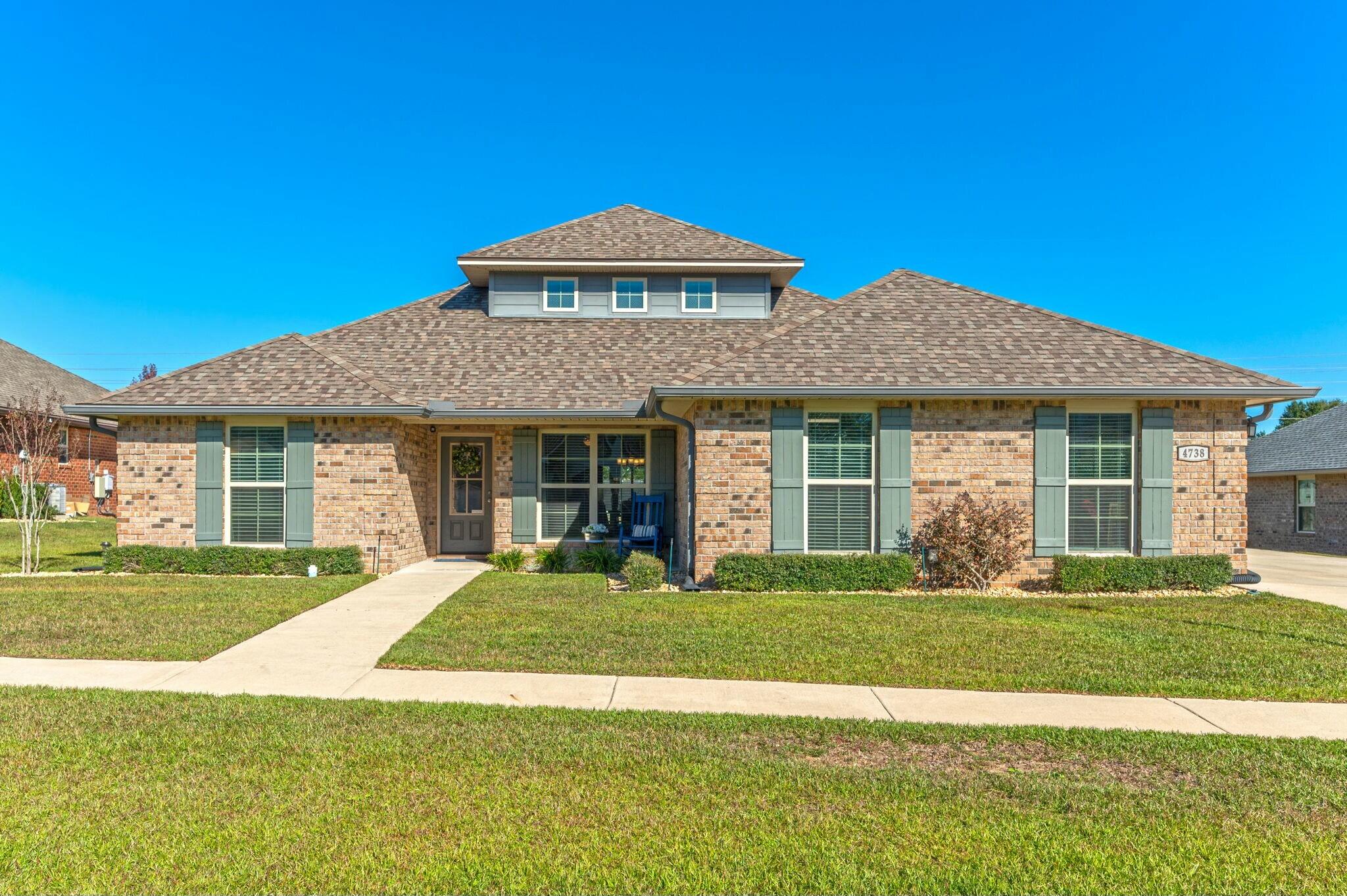 This 5/3 is located on one of the largest lots in the gated community of Chanan Estates in South Crestview. It is also a short drive to 7th Group, Eglin AFB and the gorgeous Emerald Coast! This home offers the perfect blend of comfort, style, and functionality. The open floor plan creates a seamless flow between the living, dining, and kitchen areas, which are perfect for entertaining. Head upstairs to the bonus room that provides space for a home theater, playroom, or office. The Primary Suite is a true retreat, featuring a spa-like bathroom w/tiled in shower/tub combo, double vanity, and two walk-in closets. All bedrooms are impressively spacious, ensuring comfort for everyone. Step outside to your backyard oasis, featuring a saltwater pool, covered back porch, and plenty of space for gatherings. Energy-efficient solar panels add significant value keeping utility costs low year-round...a big savings for you!  For hobbyists or car enthusiasts, the 3-car garage is a dream,equipped with a mini-split AC for year round comfort. 