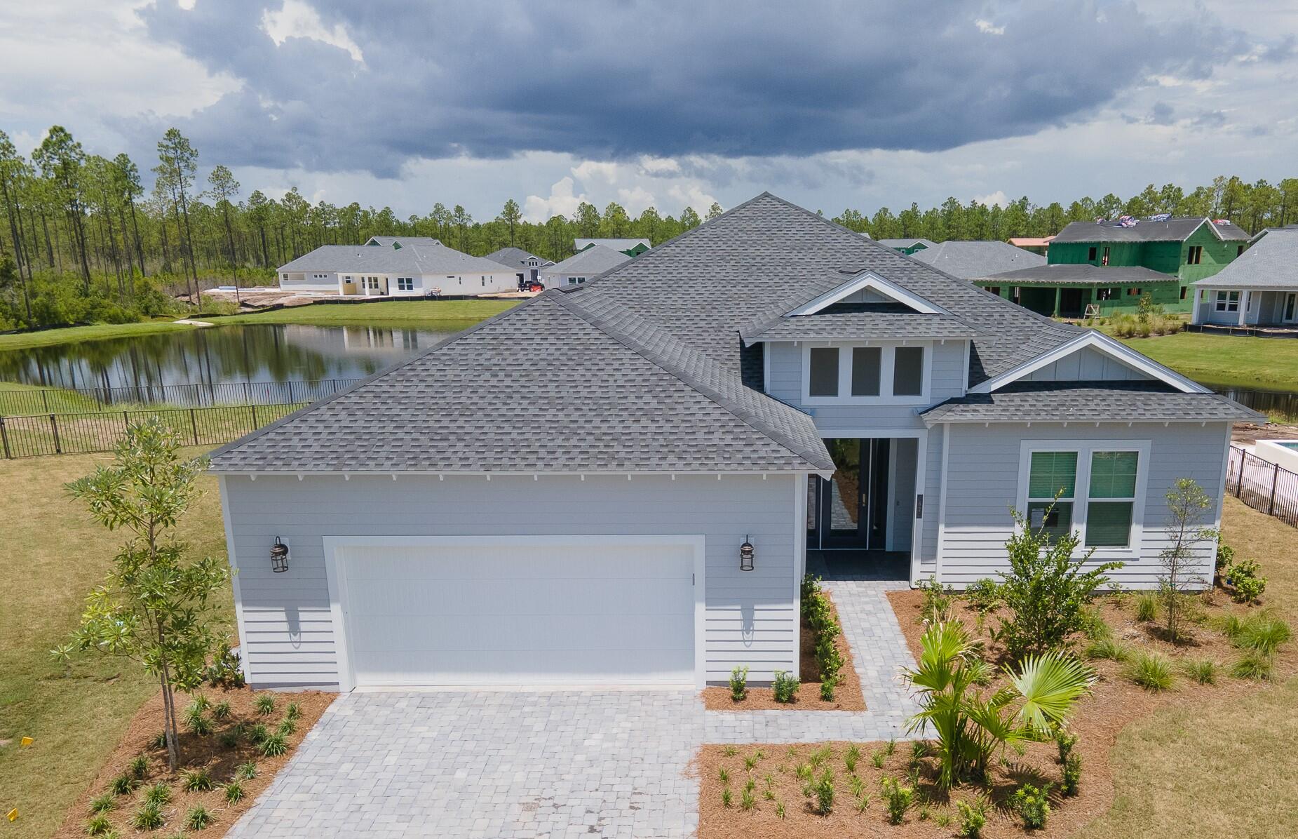 Here is your chance!! This NEW CONSTRUCTION, VILANO (largest 1story floorplan offered) on a waterfront lot is located behind the gates of the highly sought after NATUREWALK IN WATERSOUND ORIGINS. This community has its' own amenities center that is currently under construction (completion set for this August) and will offer a lakeside pool, sundeck, fitness center, tennis, pickleball, and playground. Next door and included in your HOA's, you have access to the event lawn, resort-Style pool, fitness center, Lake Powell dock access, tennis & pickleball courts, Origins Golf Course& footgolf. In addition to amazing amenities within your own neighborhood, you are directly behind the Watersound Town Center and have direct access to 30A!! This home offers tons of upgrades, don't miss out!