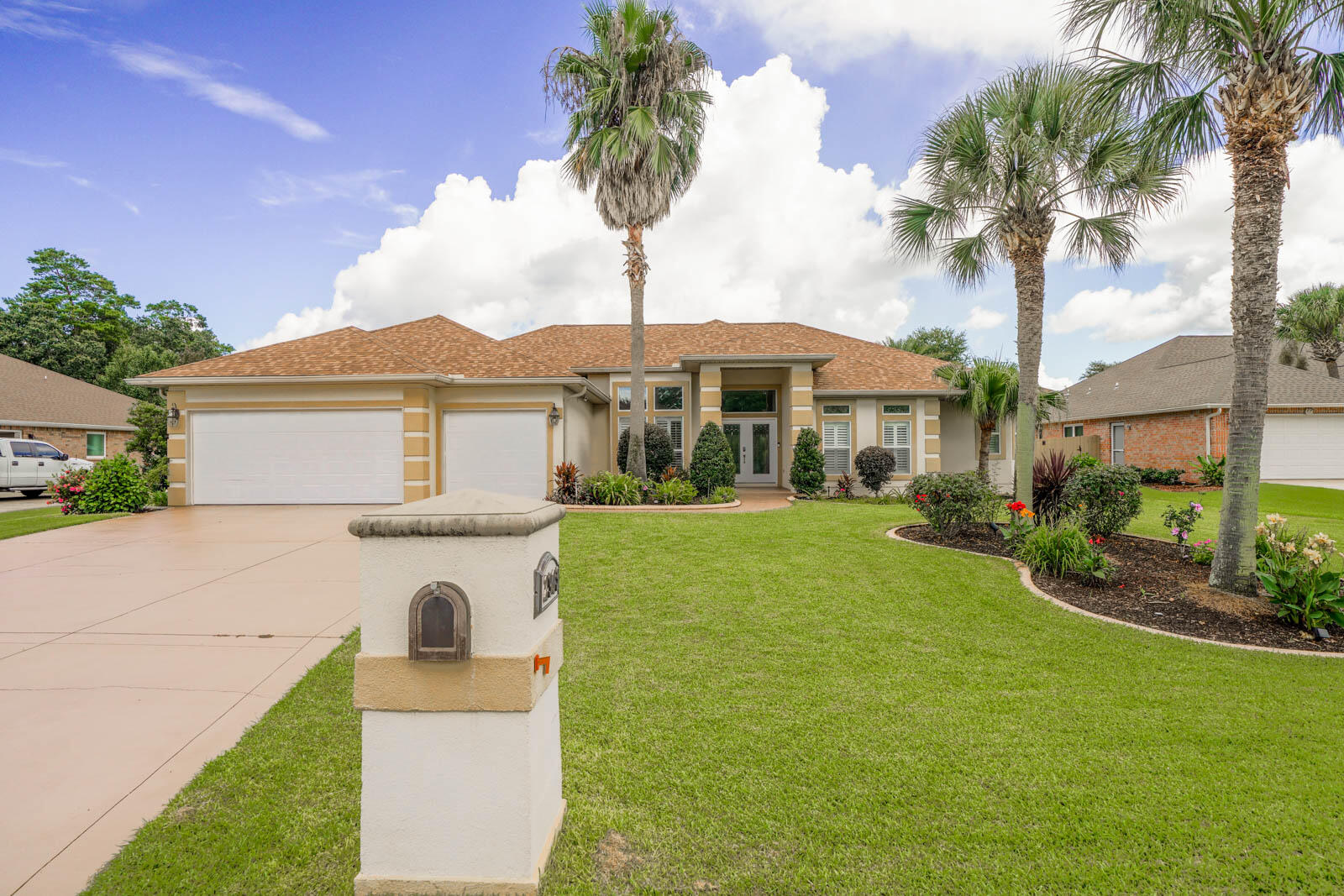 Coastal living at Hidden Creek Estates! Pool, Spa Like Backyard, Screened in outdoor kitchen and 3 car garage! This 3 bedrooms plus office and 3.5 bathrooms is stunning! The double door, leaded glass entry invites you to high soaring ceilings, tiled flooring throughout the hallways and master bedroom, crown molding, formal dining area with huge window, plantation shutters, and sunken living room. The designer, cook's kitchen and breakfast nook open to a spacious family room highlighted by a fireplace. The kitchen is amazing with an abundance of tall cabinets, some glass fronted, 6 burner gas cook-top with custom hood, stainless appliances, wall oven and microwave, refrigerator, spacious island with storage, and pot drawers under cook-top, breakfast bar, granite counter tops and exceptiona