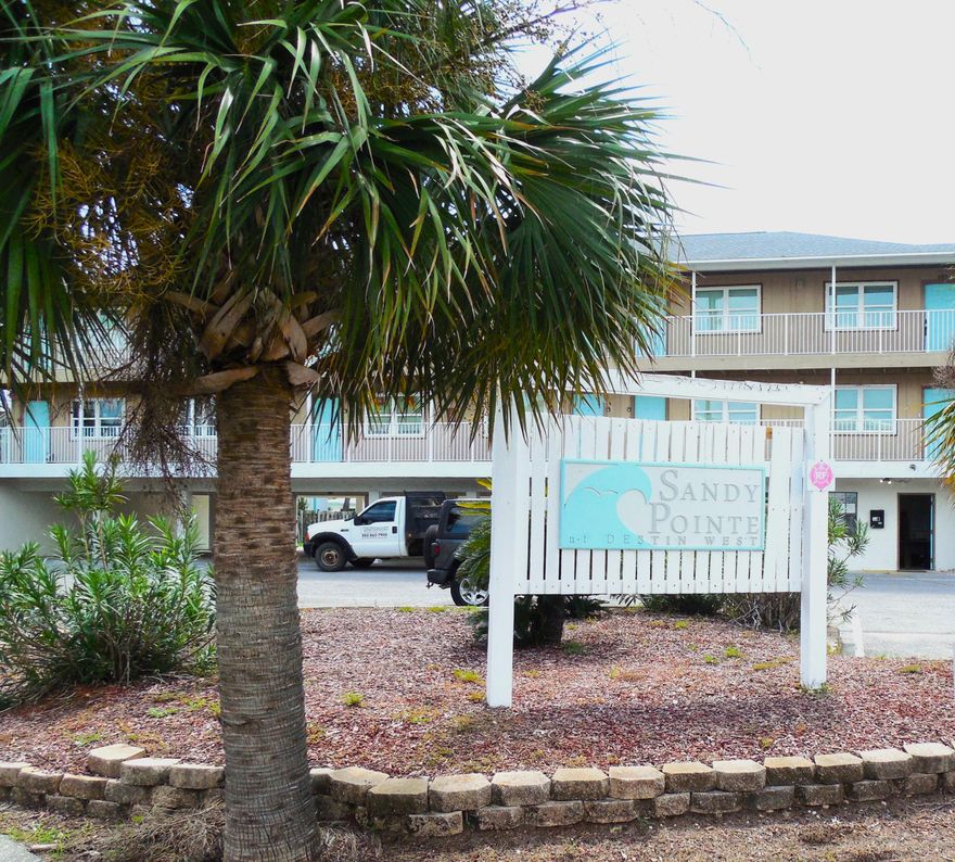Discover your dream getaway in this charming condo nestled in the heart of Okaloosa Island. Partially Furnished, (see Documents for Exclusions)1 bedroom, 1 bathroom condo, Top Floor, Corner Unit. Assigned covered parking spot with additional parking available,  Part of a VA-approved community with only 24 units, On-site laundry facilities, New roof installed in 2020, New siding and windows being installed. Steps away from the Emerald waters and white sands of the Gulf of Mexico, Walking distance to Blue Dolphin Walk Beach Access #1, Proximity to local favorites, Stewby's Seafood Shanty, Mini golf, Ice cream shops. Ideal for primary residence, second home, or investment property, Long- and short-term rentals allowed.
