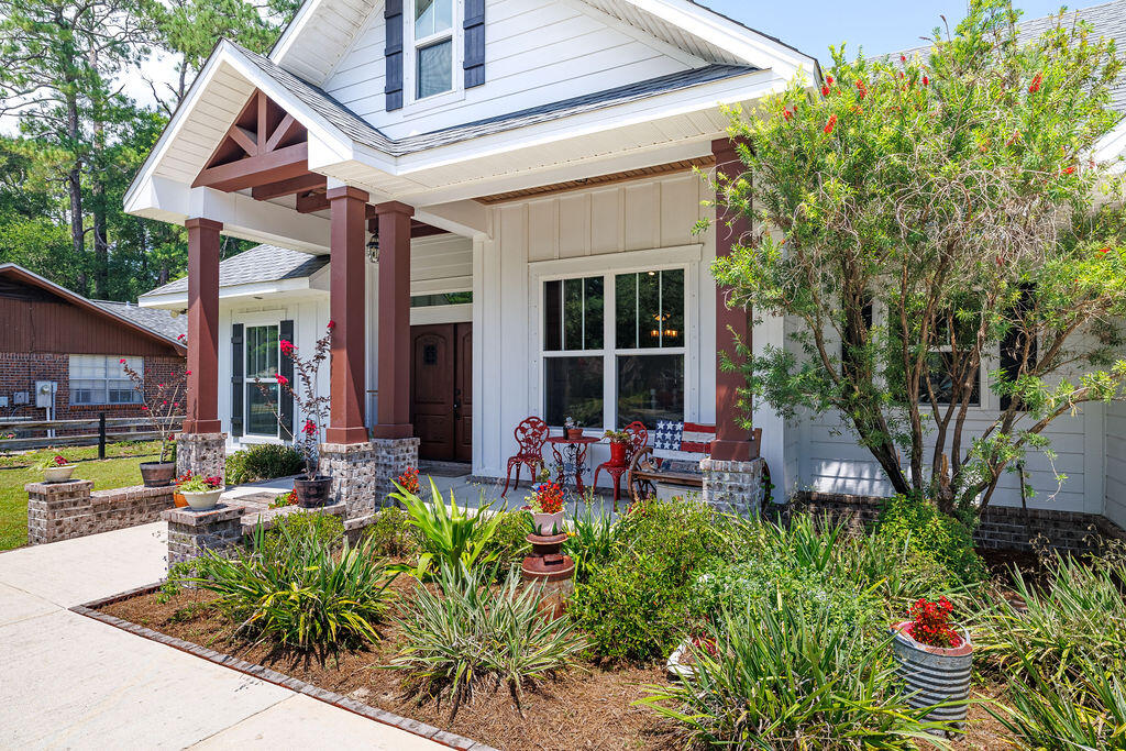 Ever Dreamed of Country Living in the City? We'll look at This!! Click on the photos to discover all the conveniences of this Modern Custom Farmhousesituated on an almost 1/2 acre lot! So many wonderful elements make this home built with great integrity by''Hicks/Locke Const.'' truly special! As you enter the beautiful double front doors to this Open Floorplan home with 18 ft. Cathedral Ceilings, your eye will bedrawn to the gas fireplace wrapped in ship lap all the way to the top, the Hand Designed & Painted Burnt Knotty Pine Cabinets, High Grade LVP Flooring, The Farm Sink & Pot Filler, the Oversized Windows, an incredible pantry, & so much more! Here's the Great News...it has an Assumable VA Mortgage at a rate of 3.375%! Come see it today, make it yours, and love it forever!